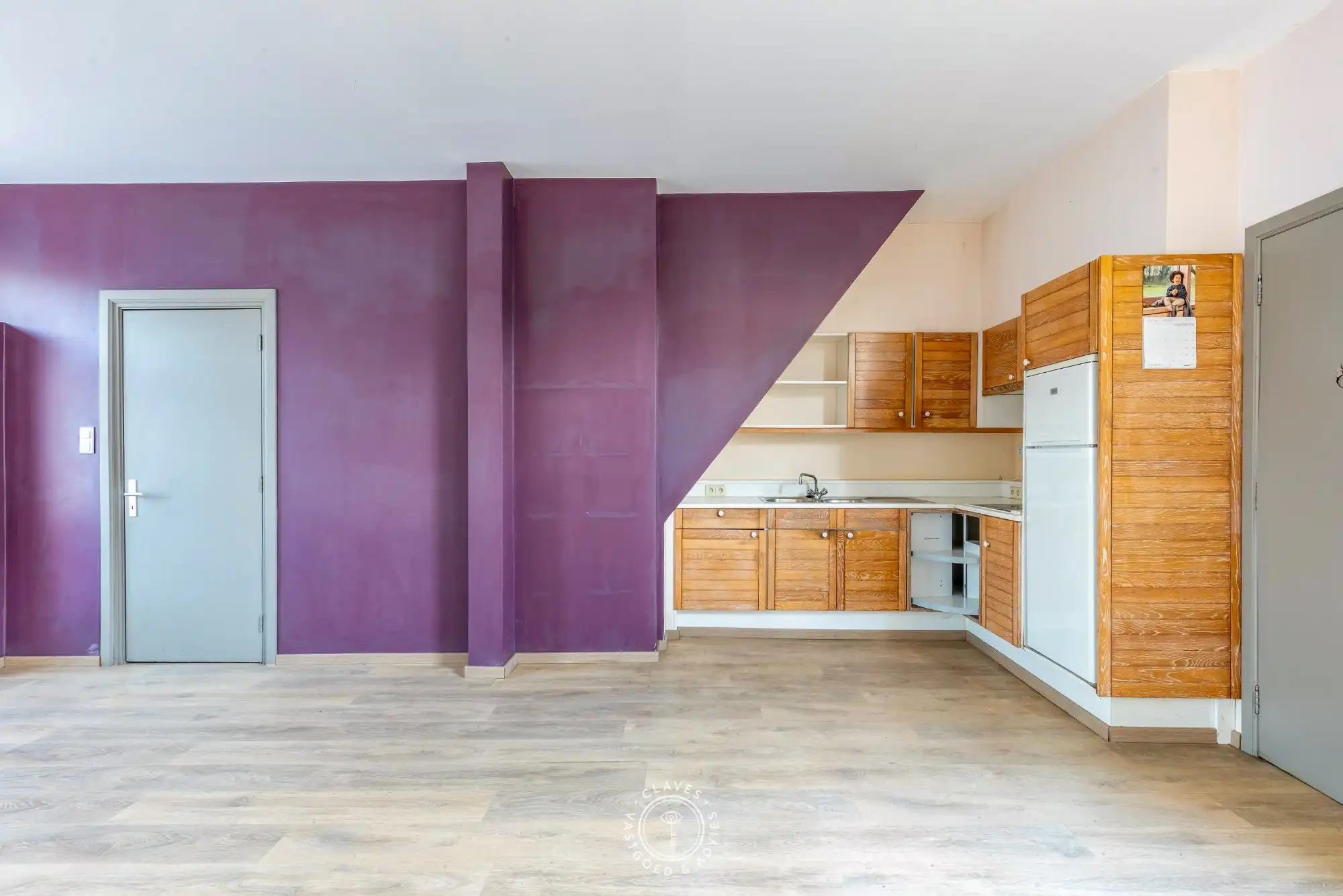 Te renoveren rijwoning met mogelijkheden in het hart van Nieuwkerken-Waas foto 4