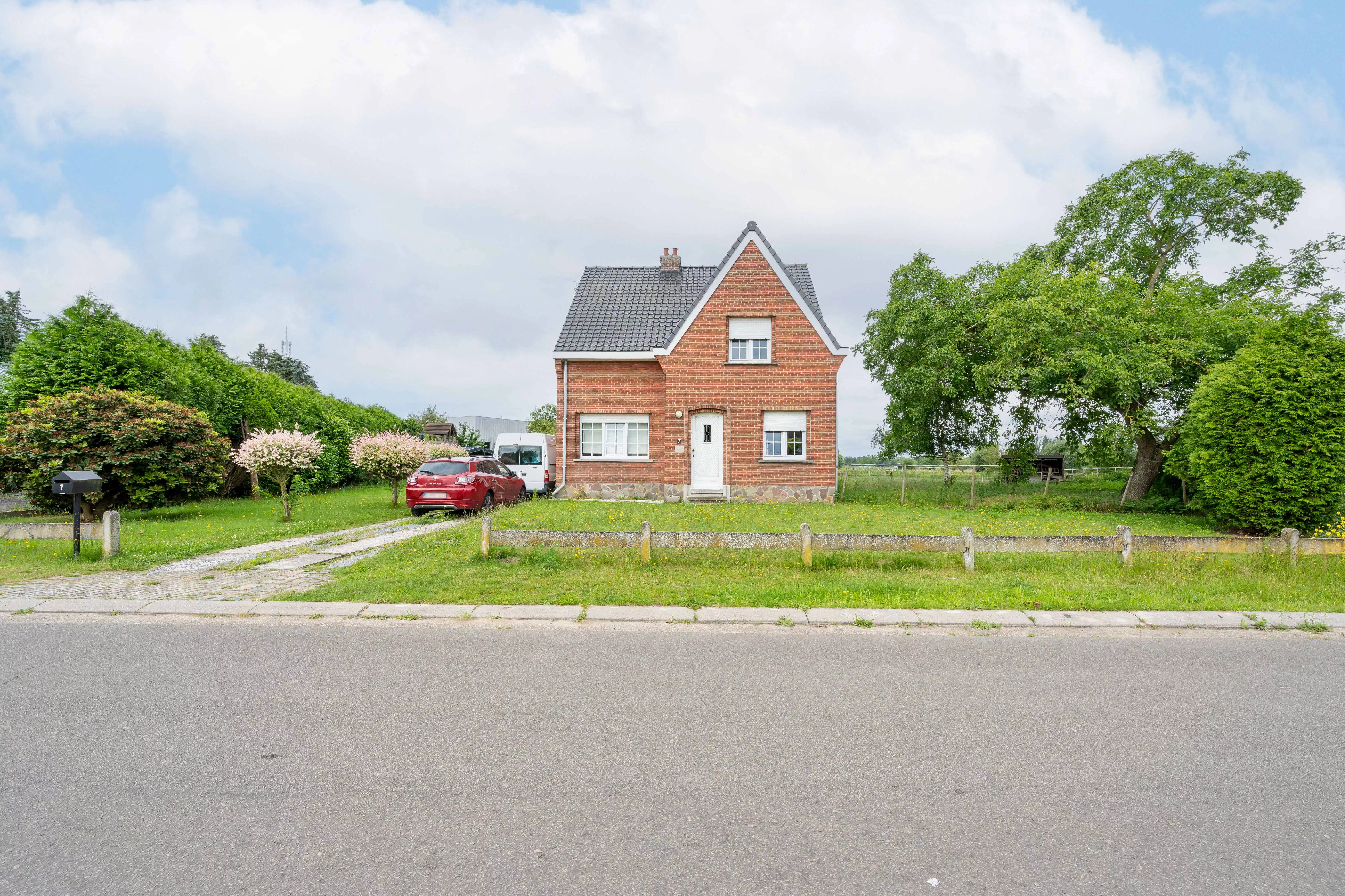 Rustig wonen in een charmante woning met ca. 31 are grond foto 12