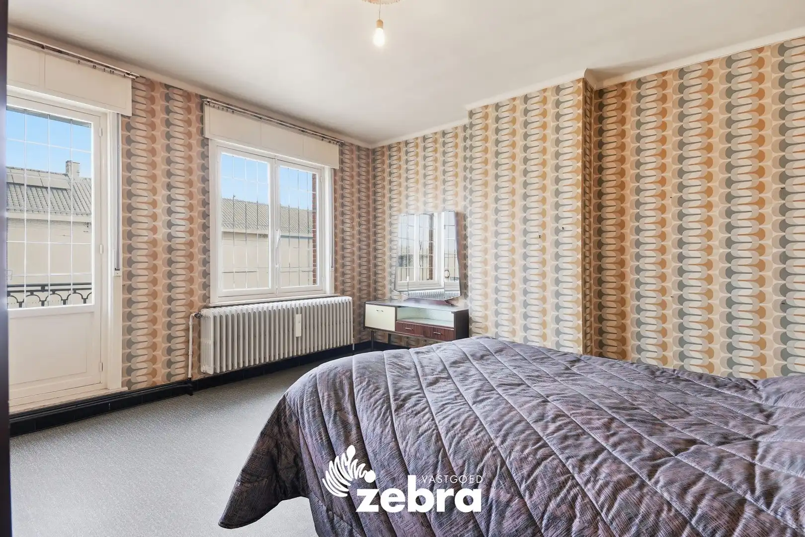 Woning met veel potentieel, 3 slaapkamers en ruime zolder in hartje Tielt! foto 11