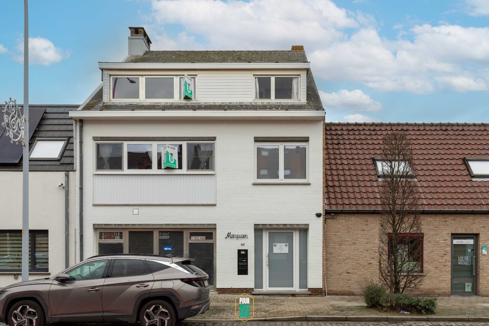 Hoofdfoto van de publicatie: Verrassend ruime woning met grote garage, tuin en praktijkmogelijkheid of kangoeroewoning te Sint-Kruis.