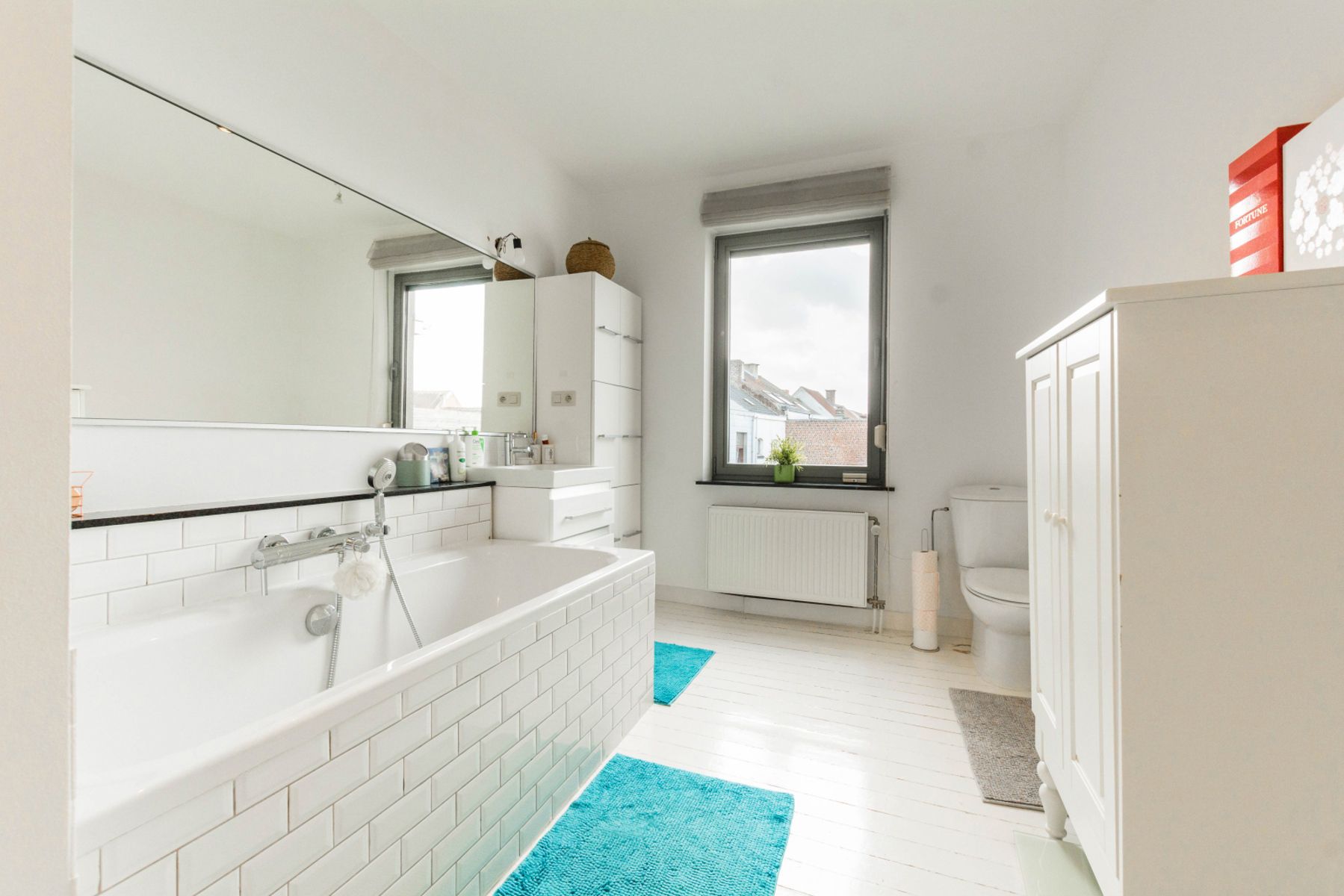 Instapklare rijwoning met 2 slaapkamers, zonneterras en tuin foto 11