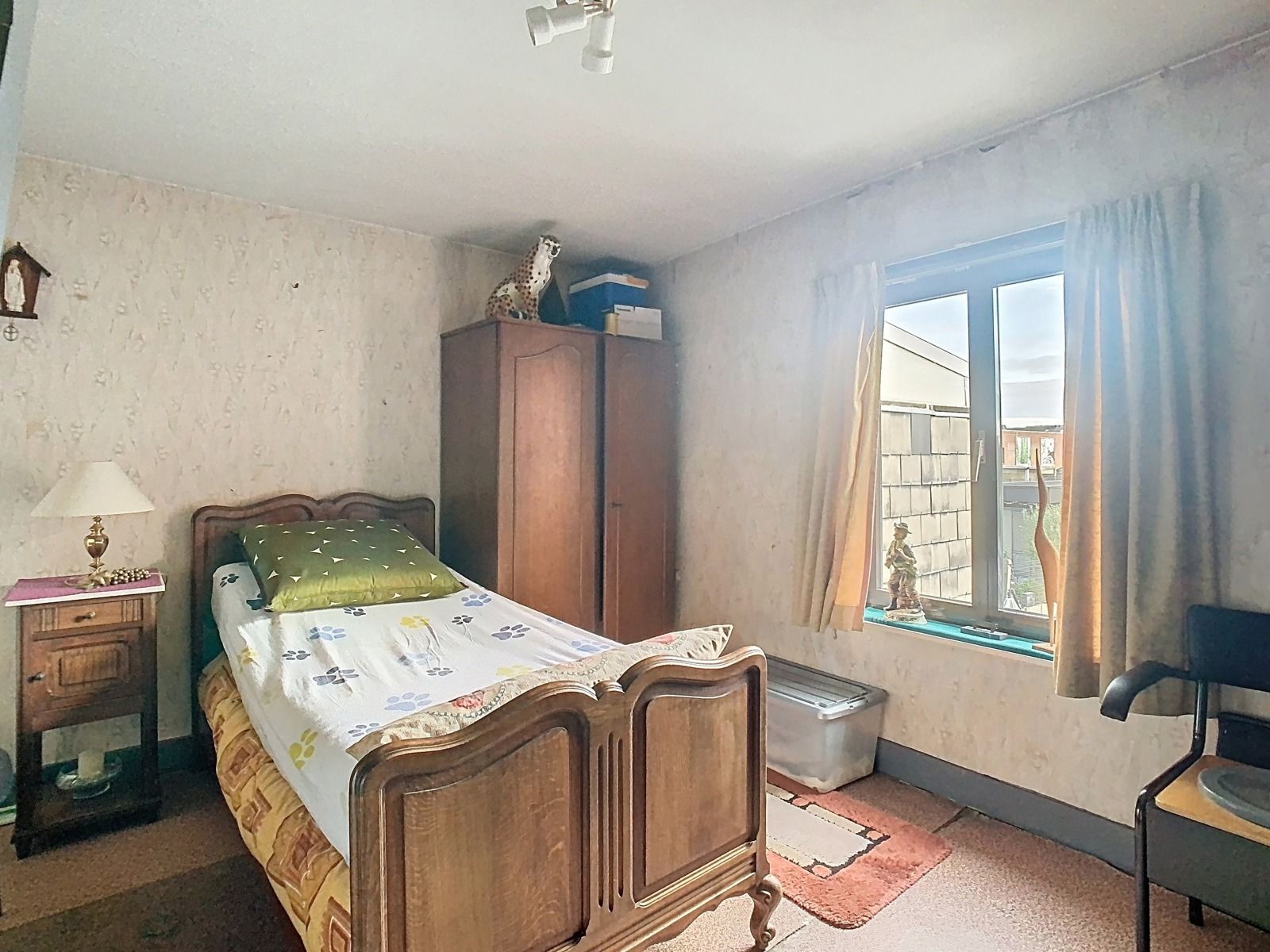 Centraal gelegen, Te renoveren Woning met 2 SLPK én Tuin! foto 10