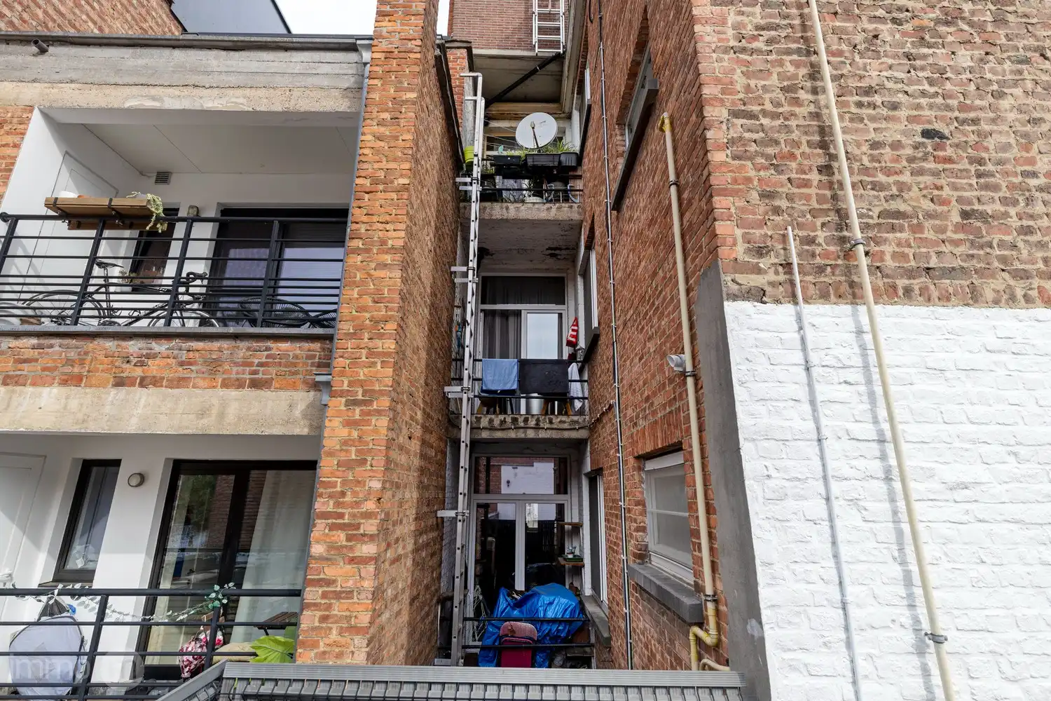Opbrengsteigendom met 9 appartementen en handelsruimte op toplocatie nabij station Leuven foto 26