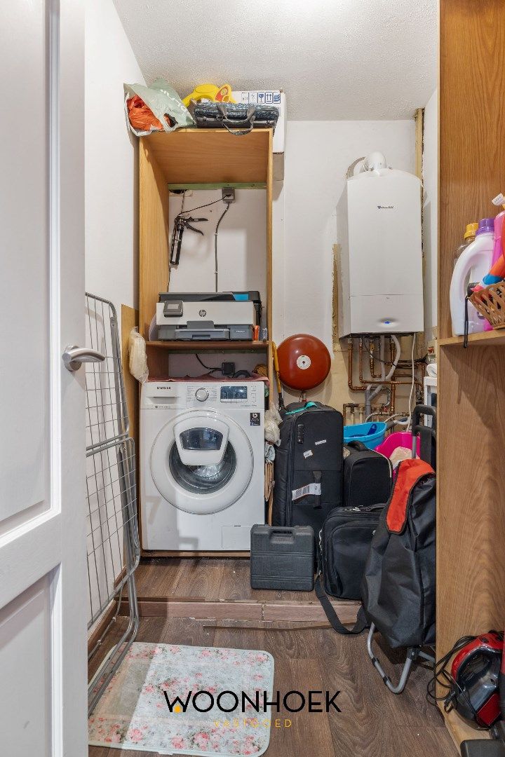 Ruim gerenoveerd 2-slpk appartement in het centrum foto 13
