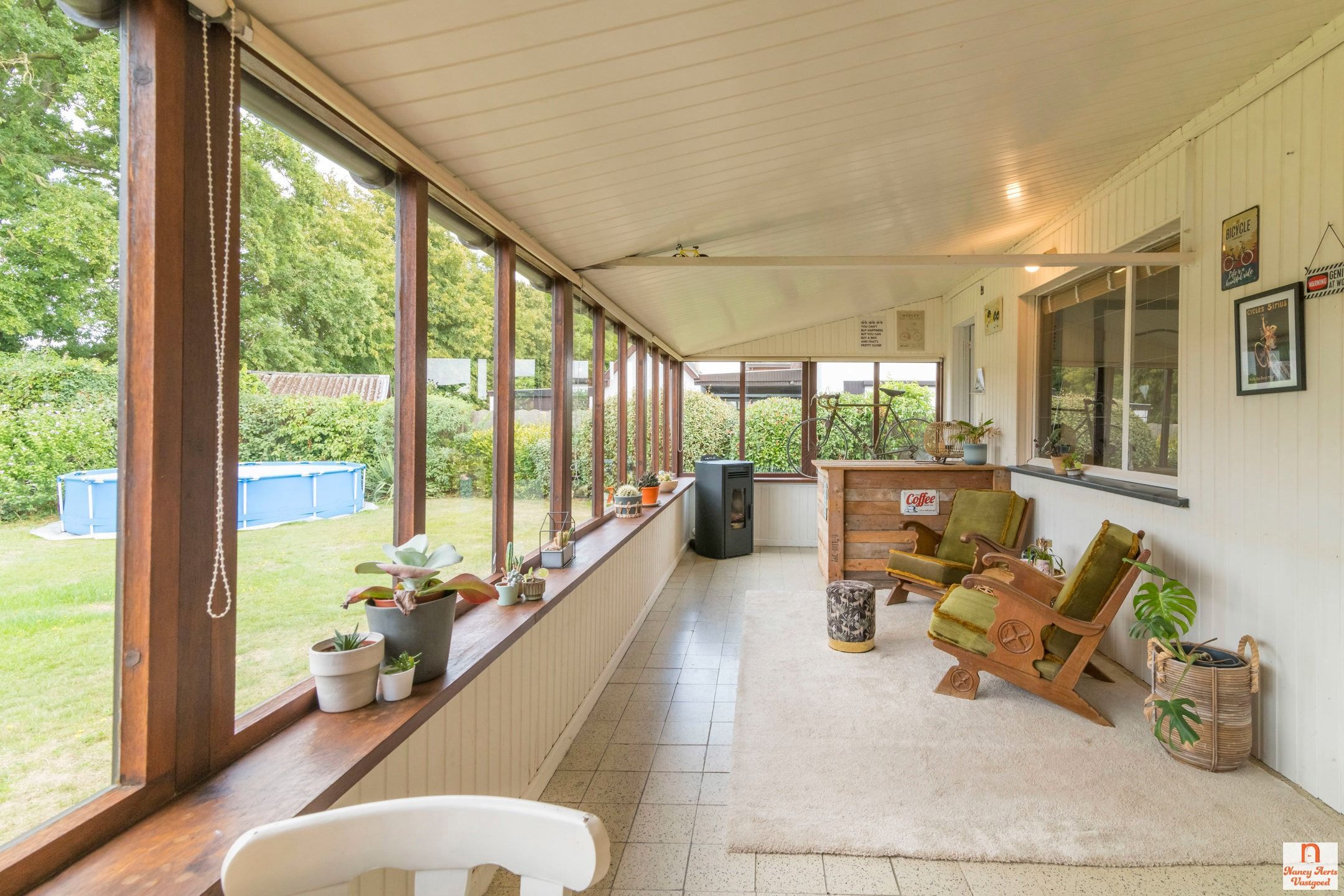 Sfeervolle jaren ’60-woning met grote tuin in rustige straat foto 23