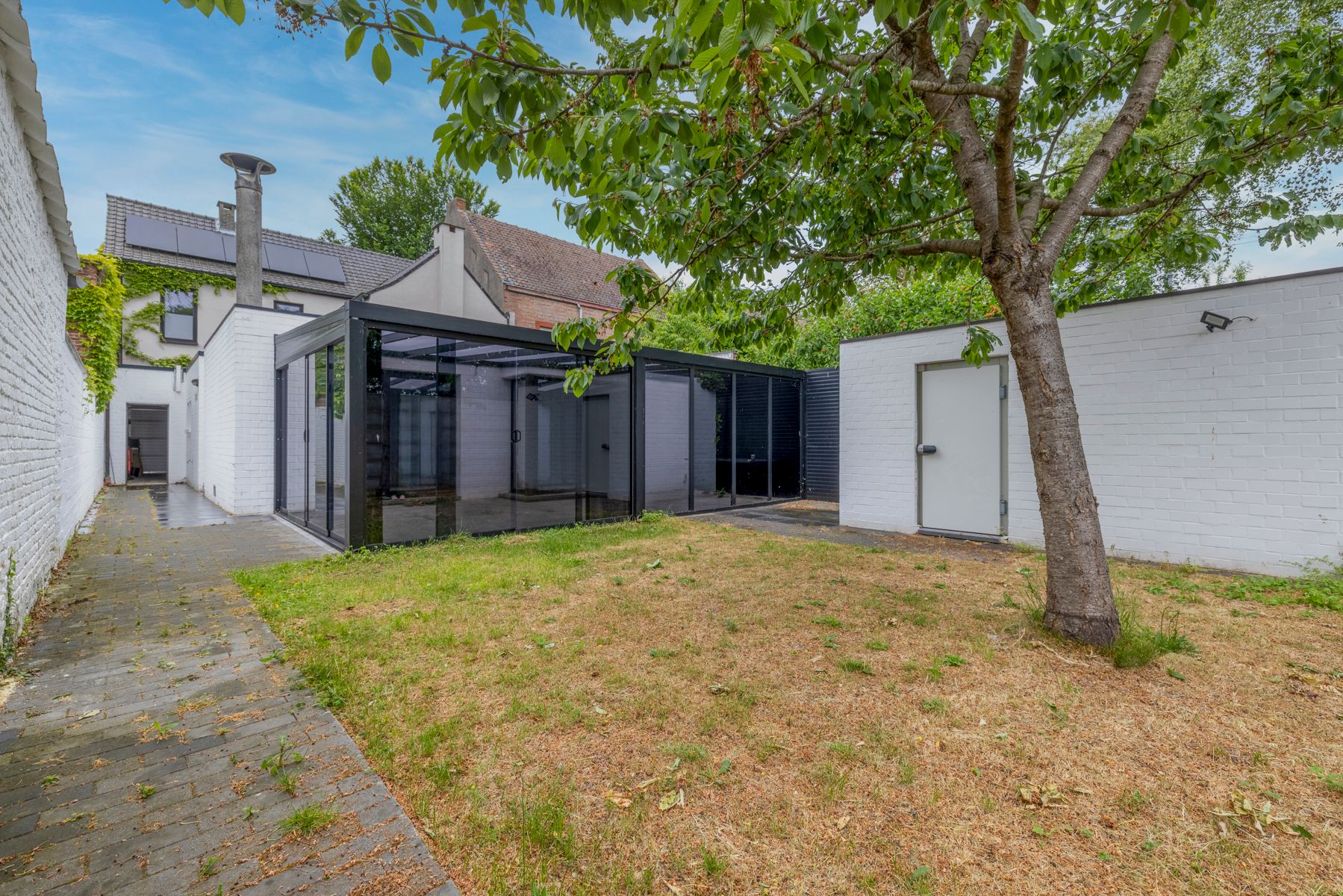 Woning met 3 slaapkamers, tuin en polyvalente ruimte te koop foto {{pictureIndex}}