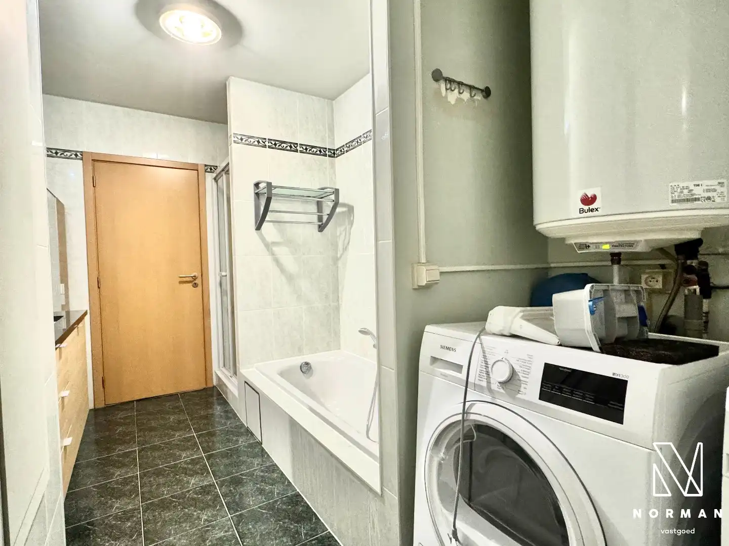 Gelijkvloers 2-slaapkamer appartement met tuin en garage te koop in Leupegem! foto 14