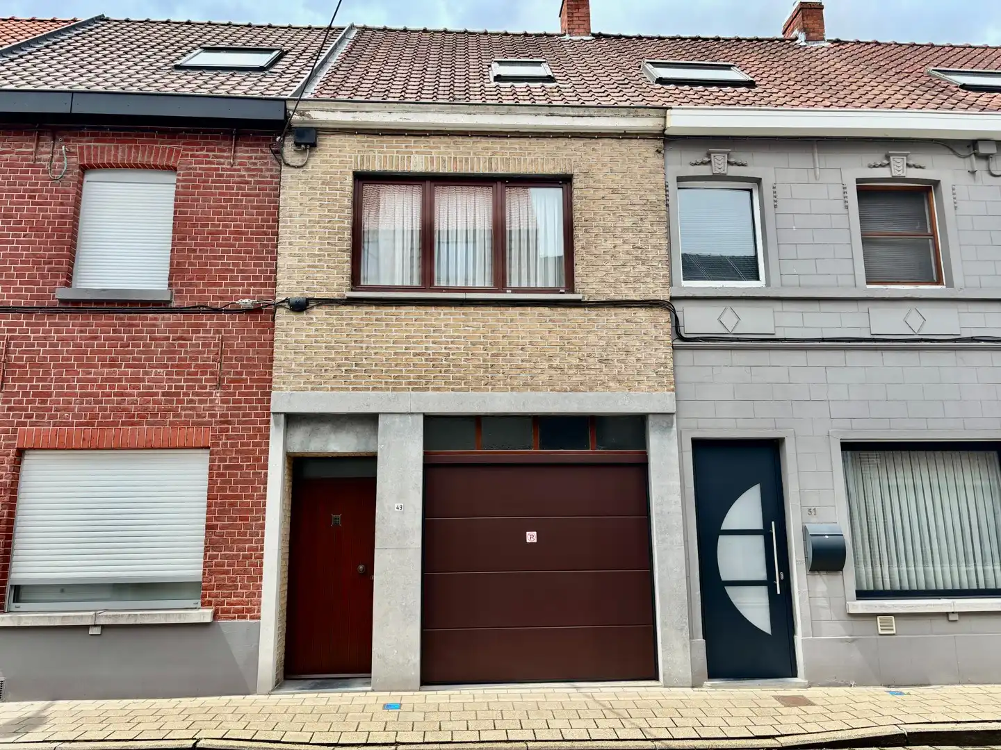Gezellige rijwoning met tuin en garage foto {{pictureIndex}}