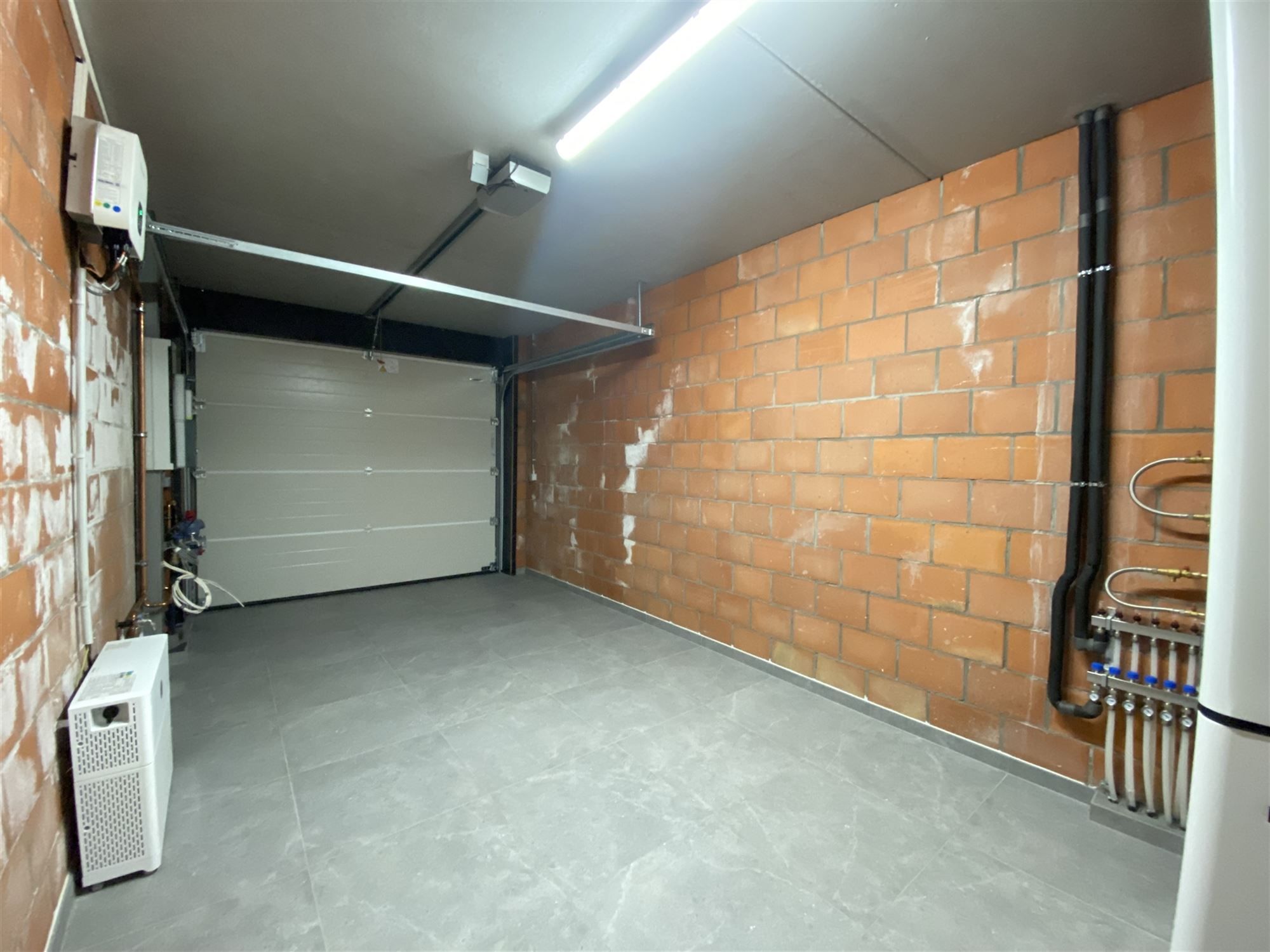 Nieuwbouwwoning te Kluizen met optimale ruimteverdeling en hedendaagse afwerking foto 12