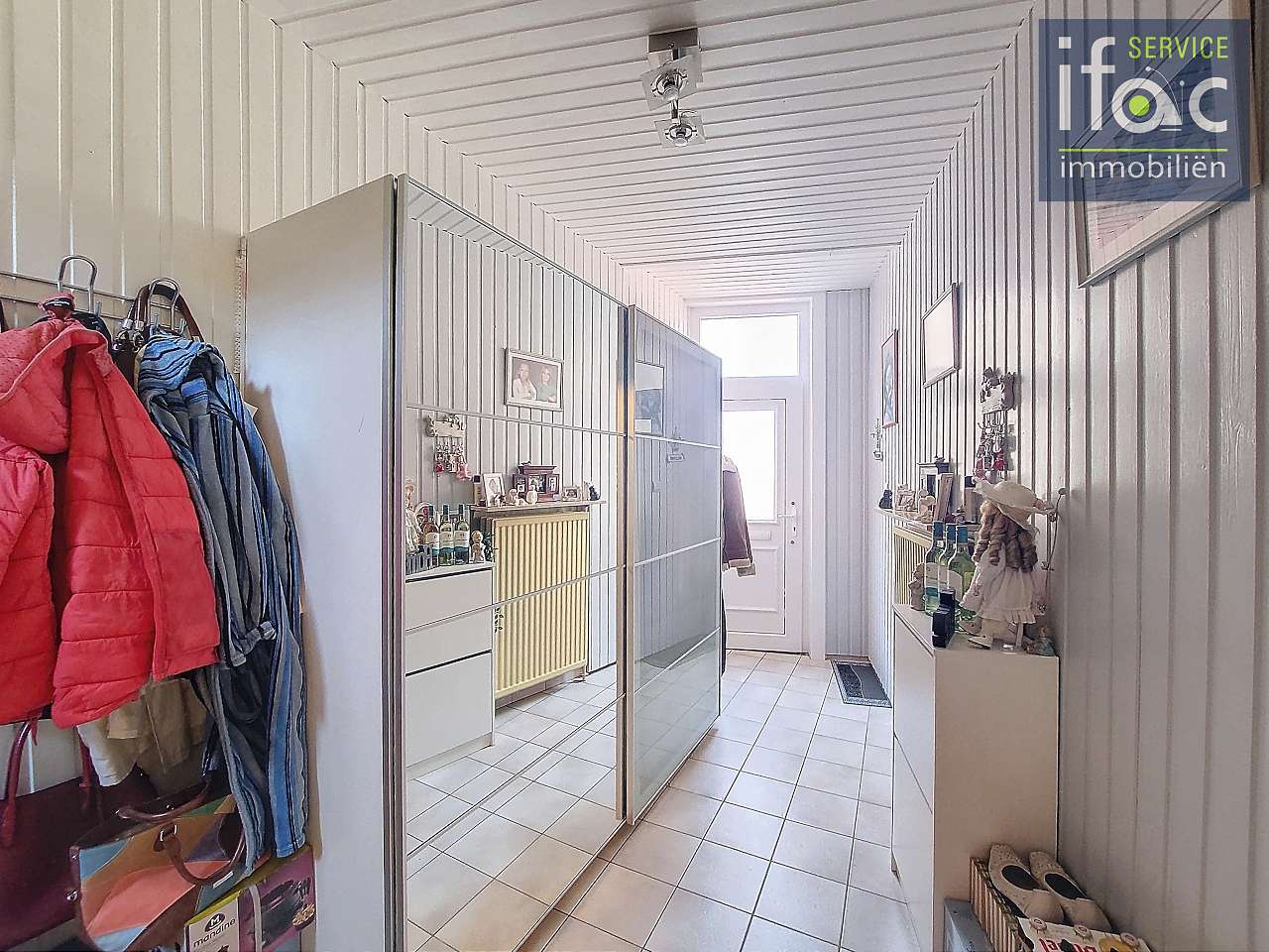 Rijhuis te koop foto 2