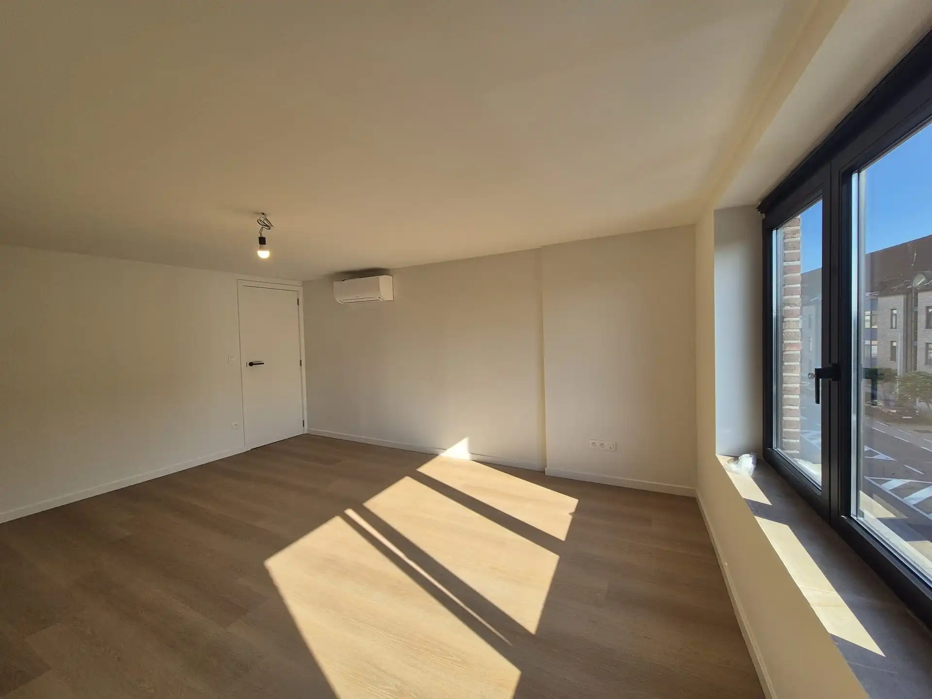 Ruim triplex appartement met polyvalente ruimte op toplocatie in het hart van Wetteren foto 18