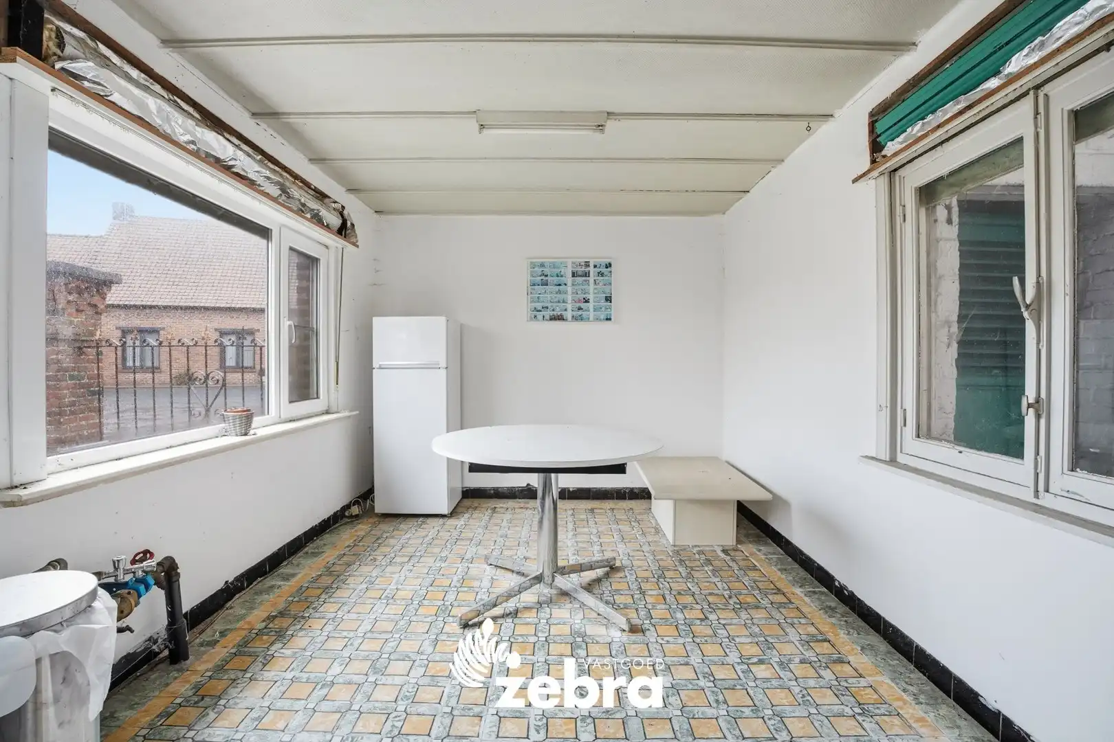 Te renoveren woning op een rustige ligging te Zwevezele! foto 7