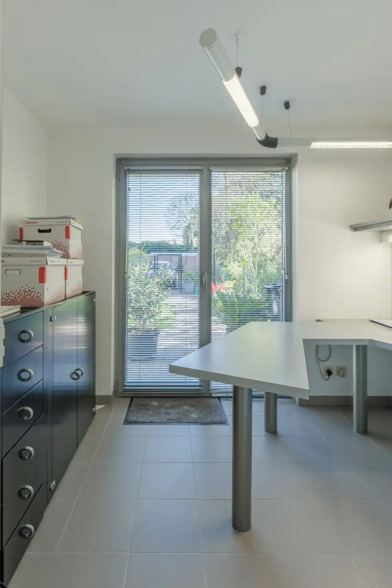 Ruime woning met praktijkruimte foto 22