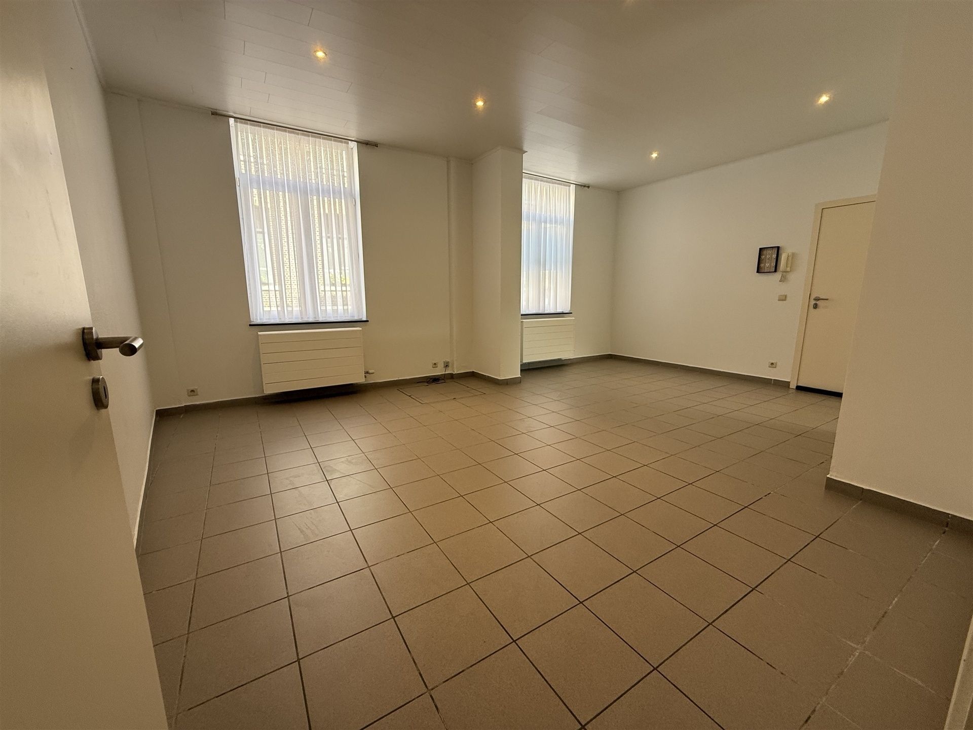 Gelijkvloers appartement met 2 slaapkamers en 2 terrassen foto 2