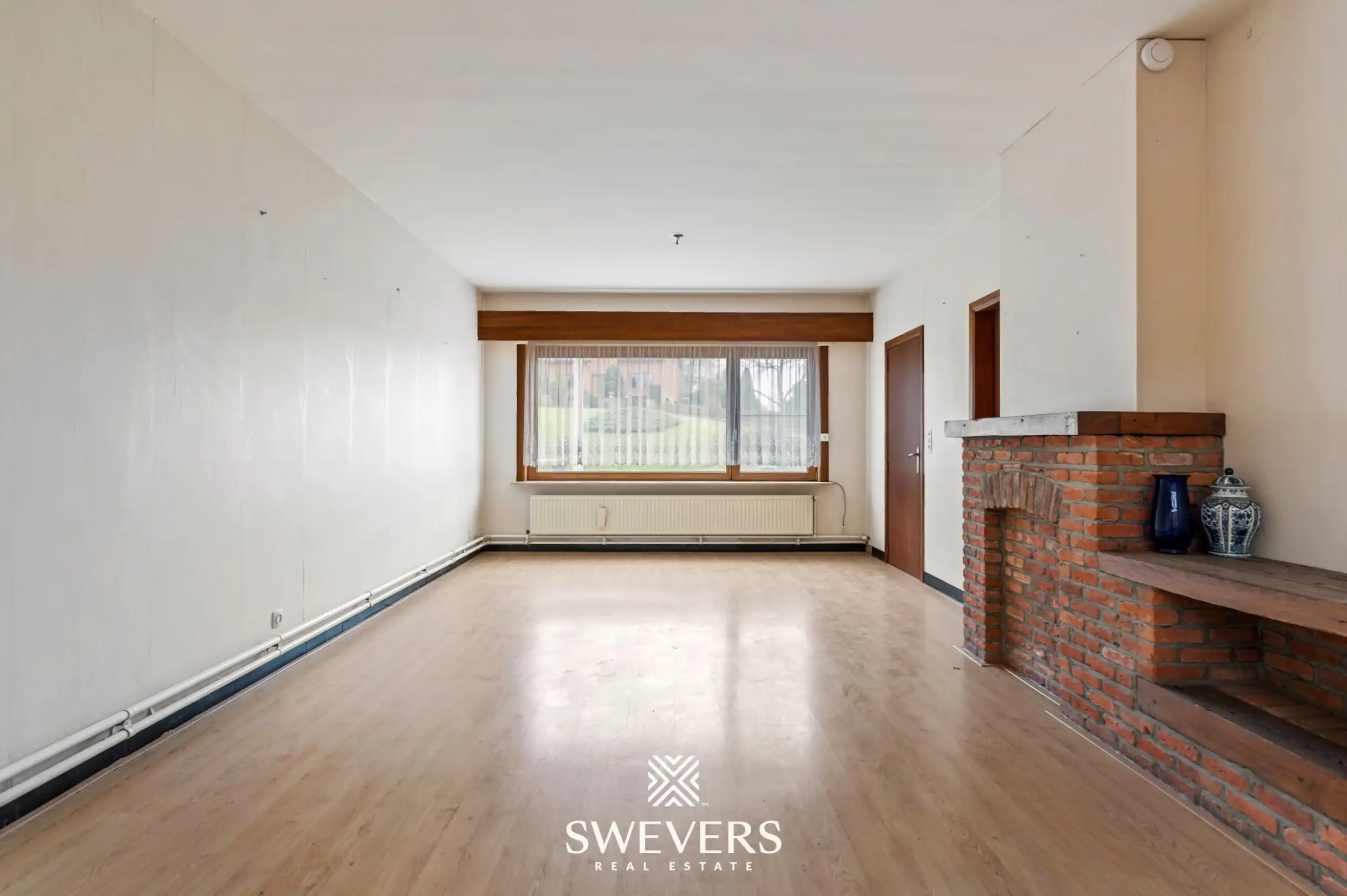 Te renoveren halfopen woning met ruim perceel in Diest foto 2