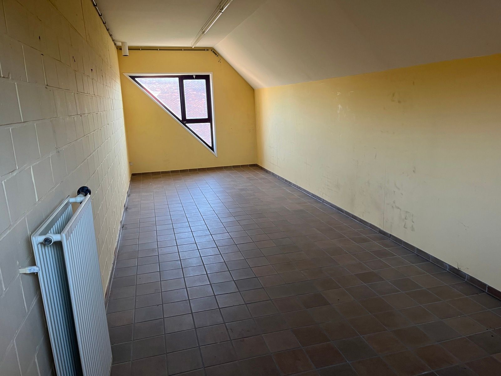 Opsplitsbare polyvalente handelsruimte met parking foto 21