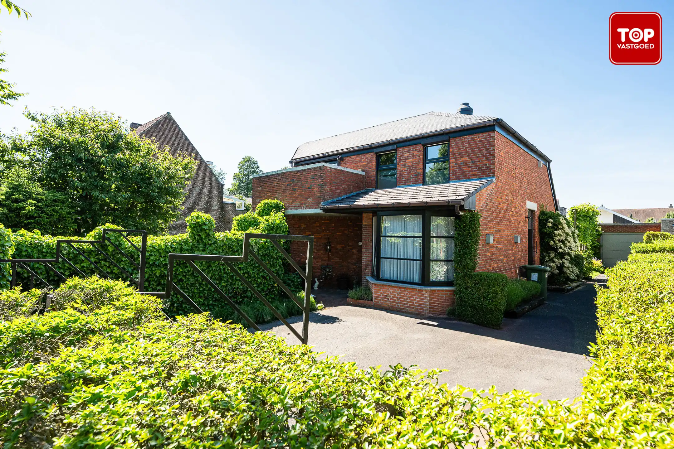 Architecturale woning met unieke split-level indeling op 659 m² in het groene Wondelgem foto 28
