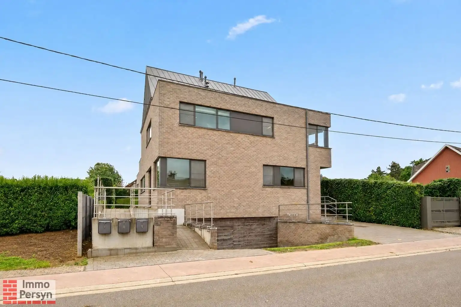 Modern en veelzijdig gebouw met 3 appartementen, rustige tuin en aanpalend perceel te Bekkevoort foto 2