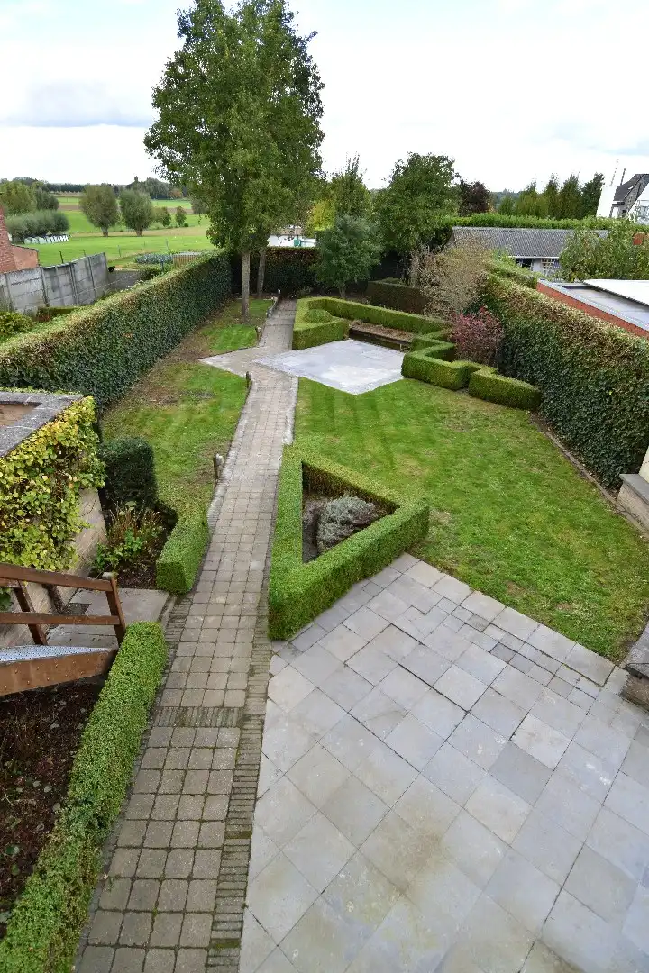 Statige woning met praktijkgedeelte (101 m²), 4 slaapkamers en zonnige tuin te koop in het straatbeeld van Bellegem foto 23