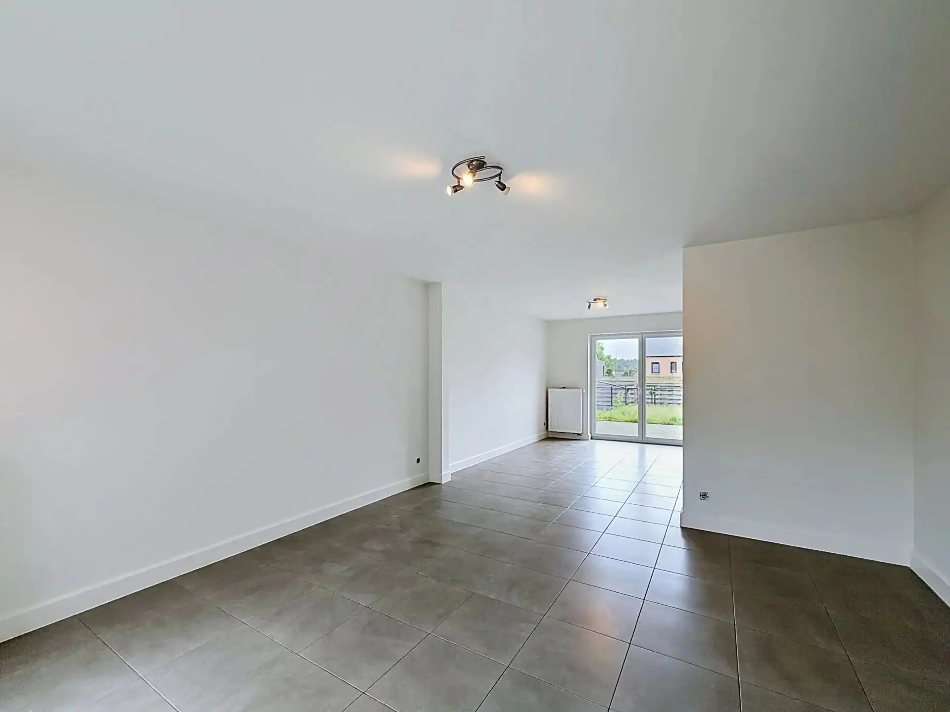 Gezellige woning met 2 grote slaapkamers, tuin en carport foto 6