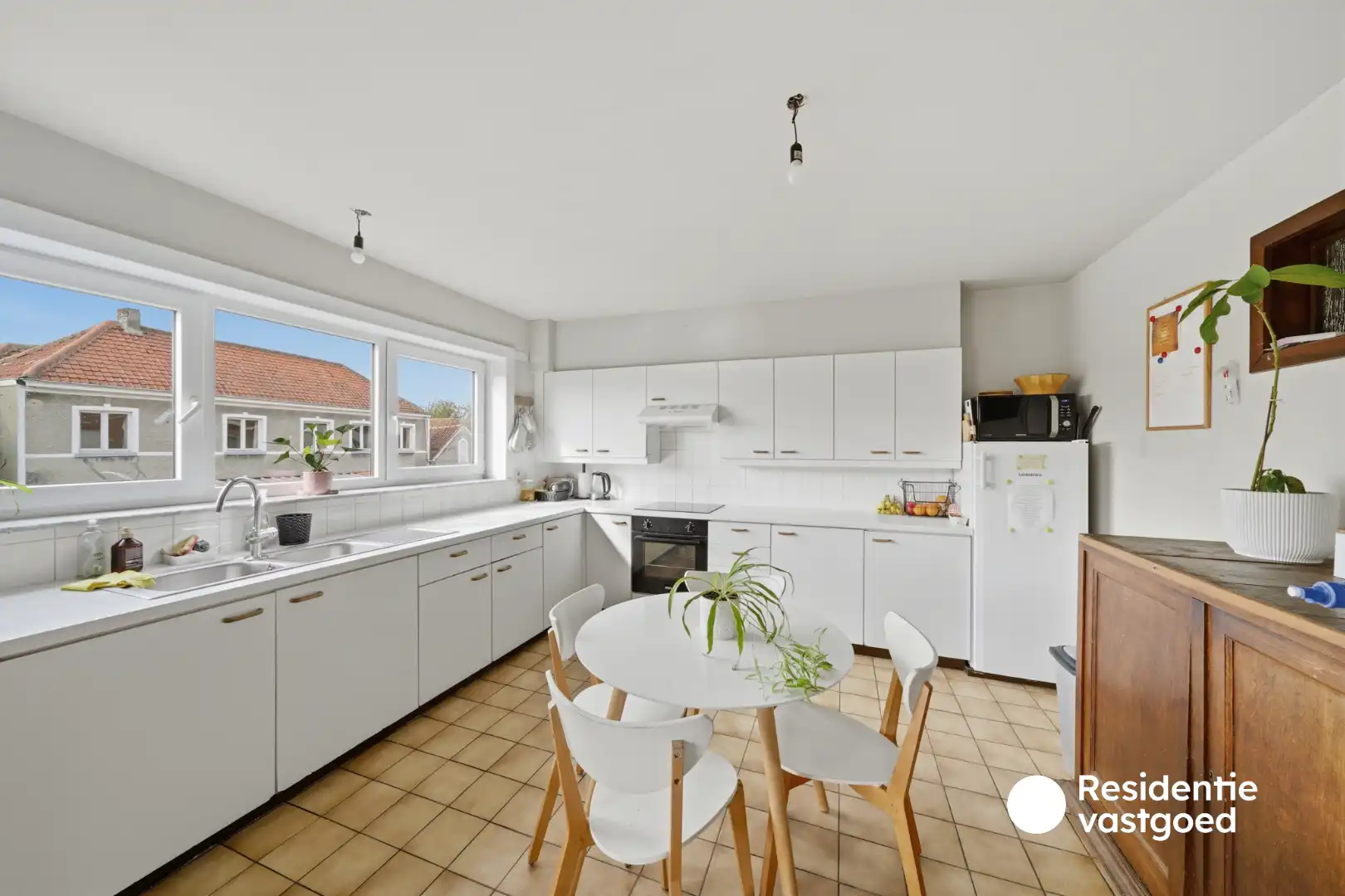 Opbrengsteigendom met 3 appartementen, garage en zonnig terras foto 9