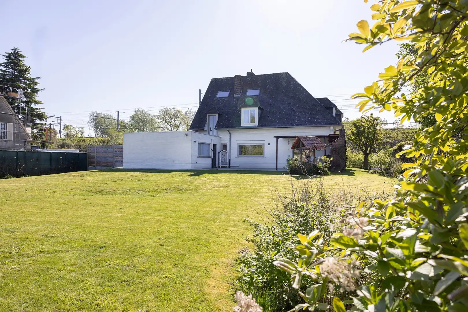Ruime alleenstaande woning met grote tuin en veel privacy. foto 21