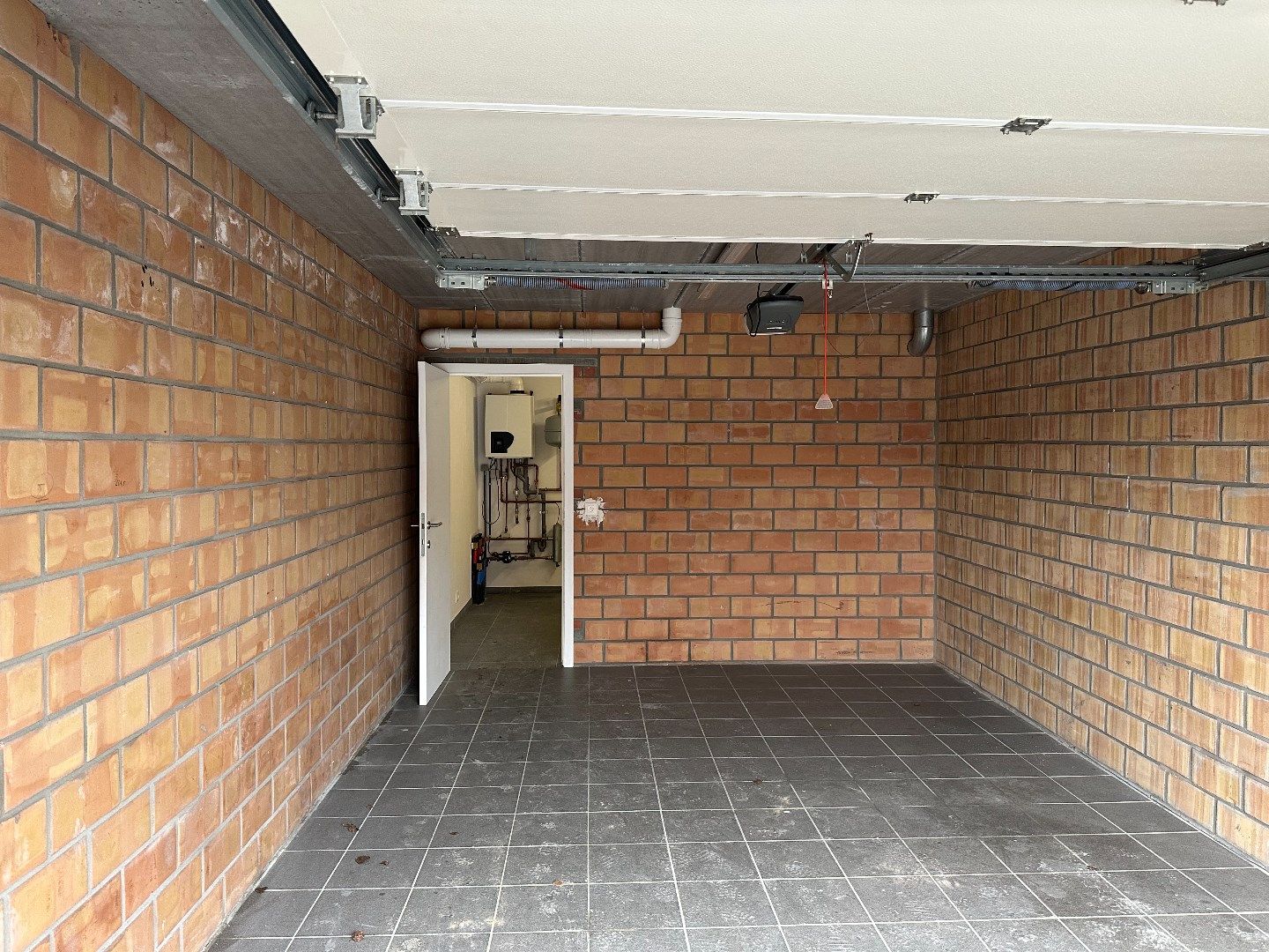 Gelijkvloers appartement met 3 slaapkamers, garage en binnentuintje foto 16