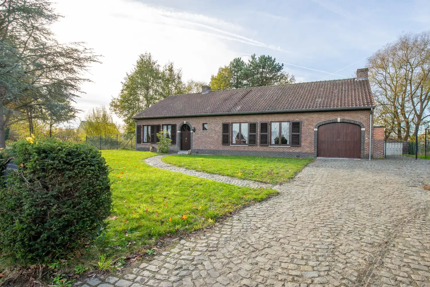 Rustig gelegen alleenstaande woning met westgerichte tuin en unieke bouwvergunning foto 4