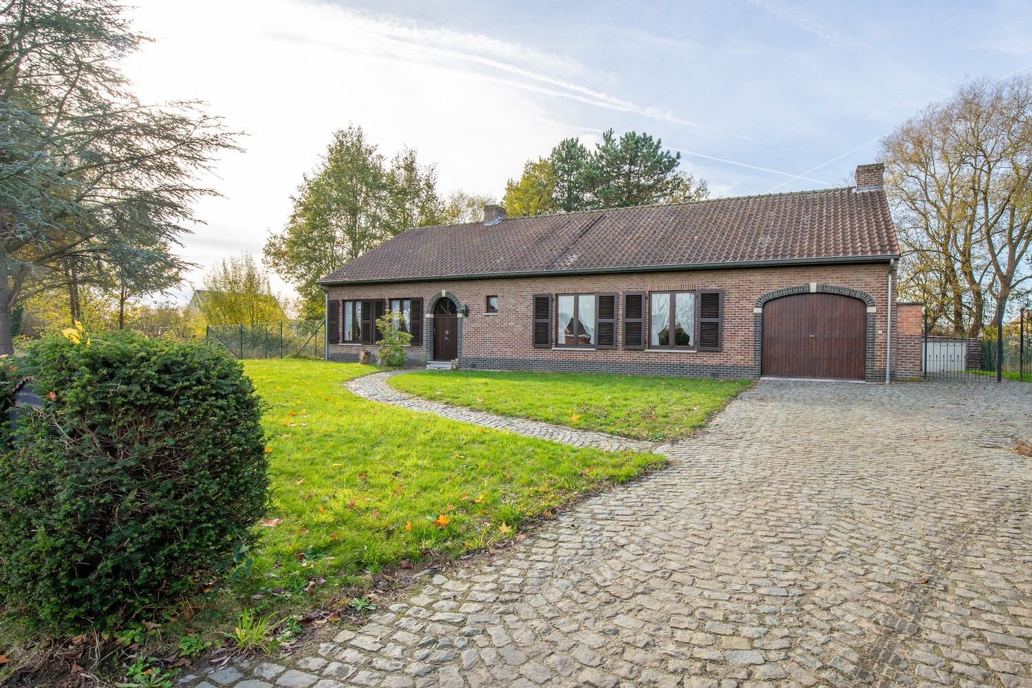 Rustig gelegen alleenstaande woning met westgerichte tuin en unieke bouwvergunning foto 4