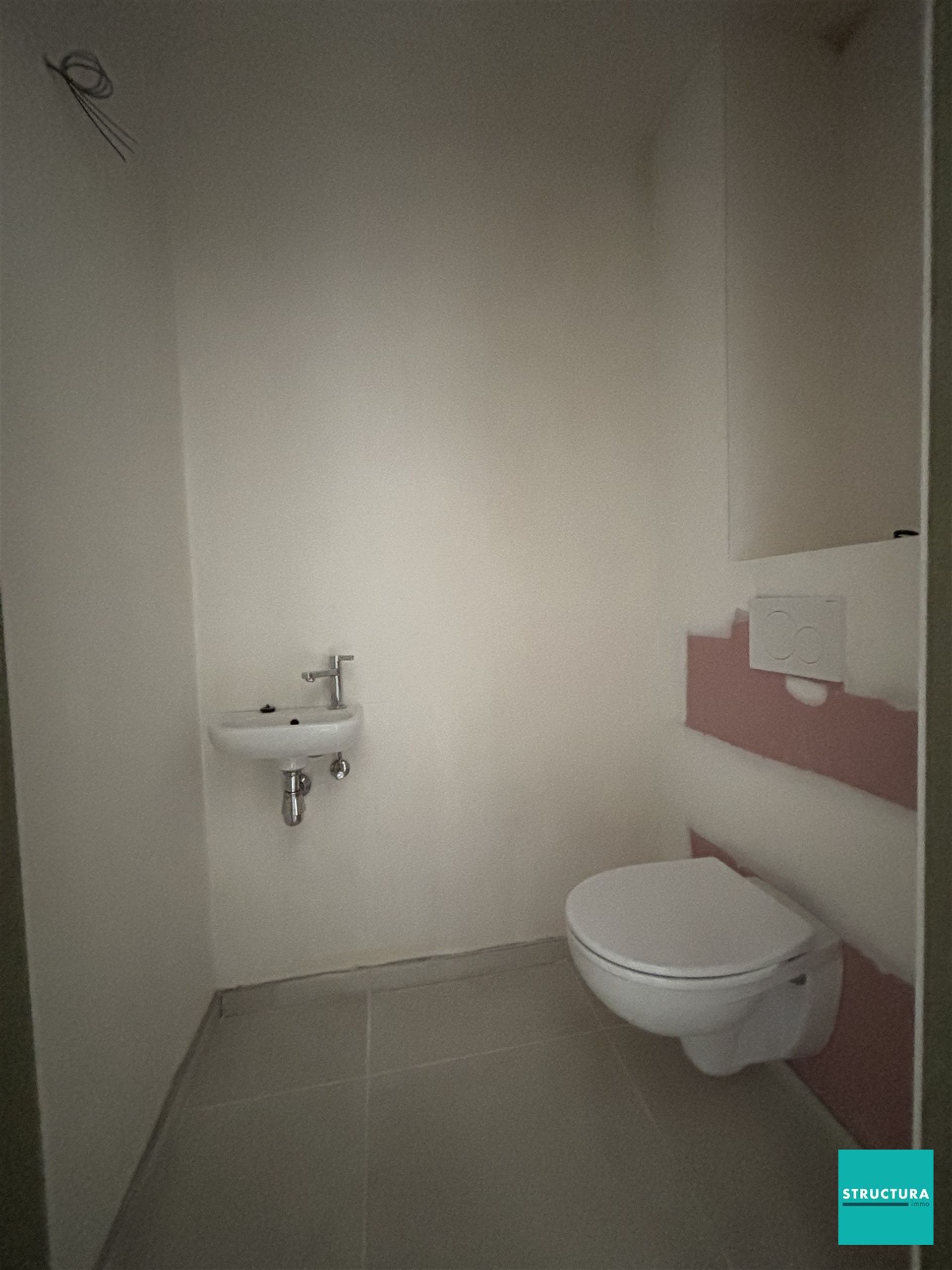 Appartement met 2 slaapkamers en 2 staanplaatsen in centrum Merchtem foto 7