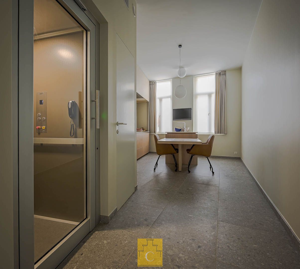 Volledig, tot in de puntjes gerenoveerde stadswoning met lift op zeer centrale ligging foto 11