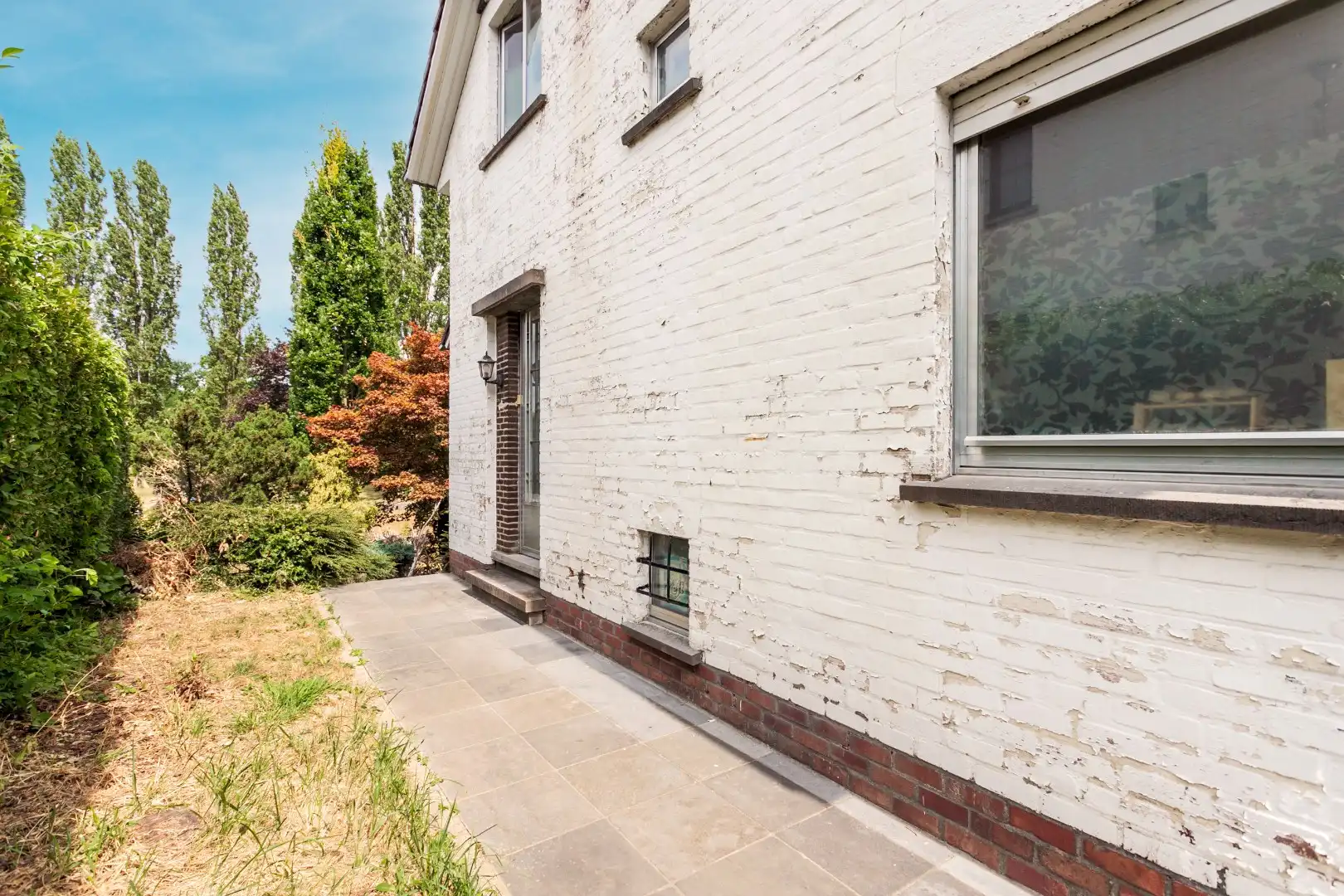 Op te frissen 3-gevel woning met 3 slpk te Halle foto 3