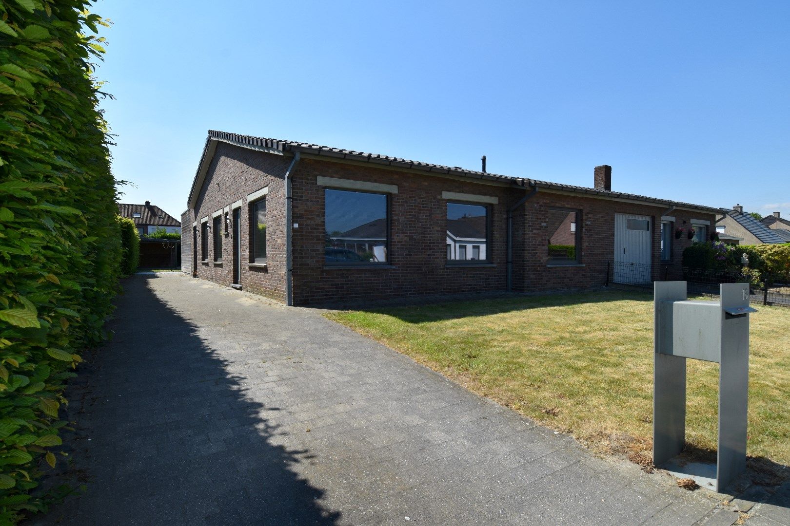Gelijkvloerse woning met 4 slaapkamers en zuid-gerichte tuin te koop in Wevelgem foto 19