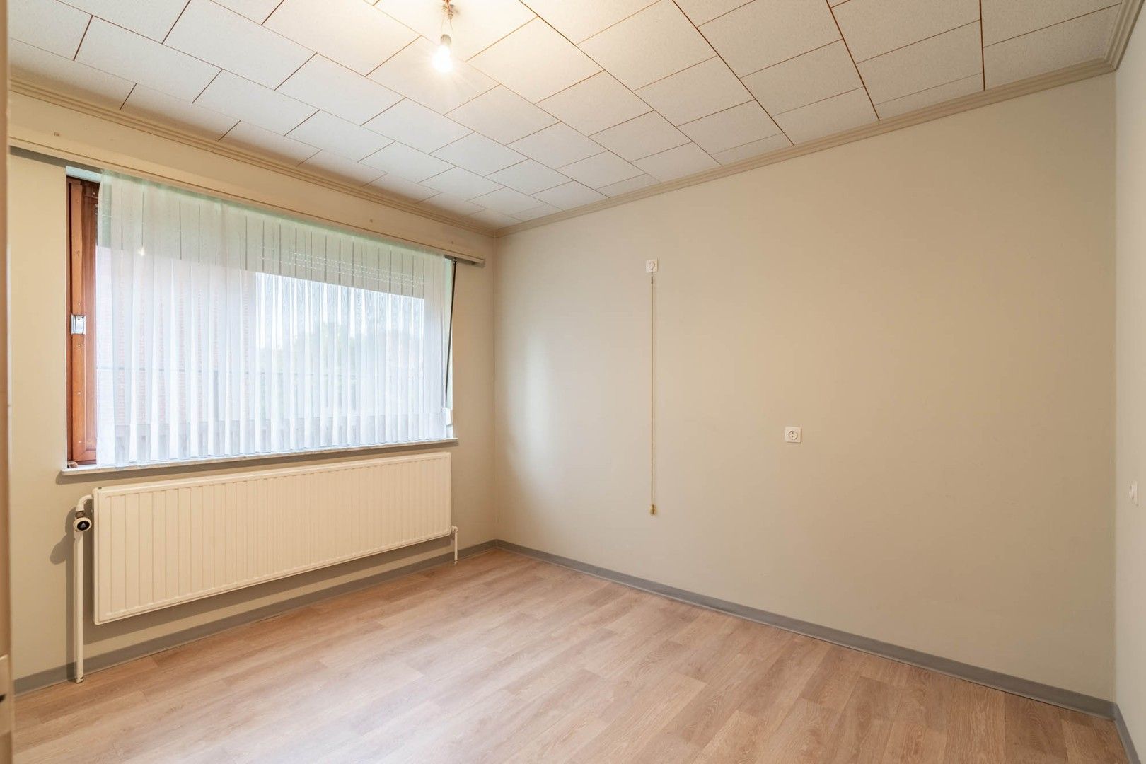 Te Koop: Te Renoveren Woning op een Perceel van 714m² in Groene Omgeving te Houthalen foto 5