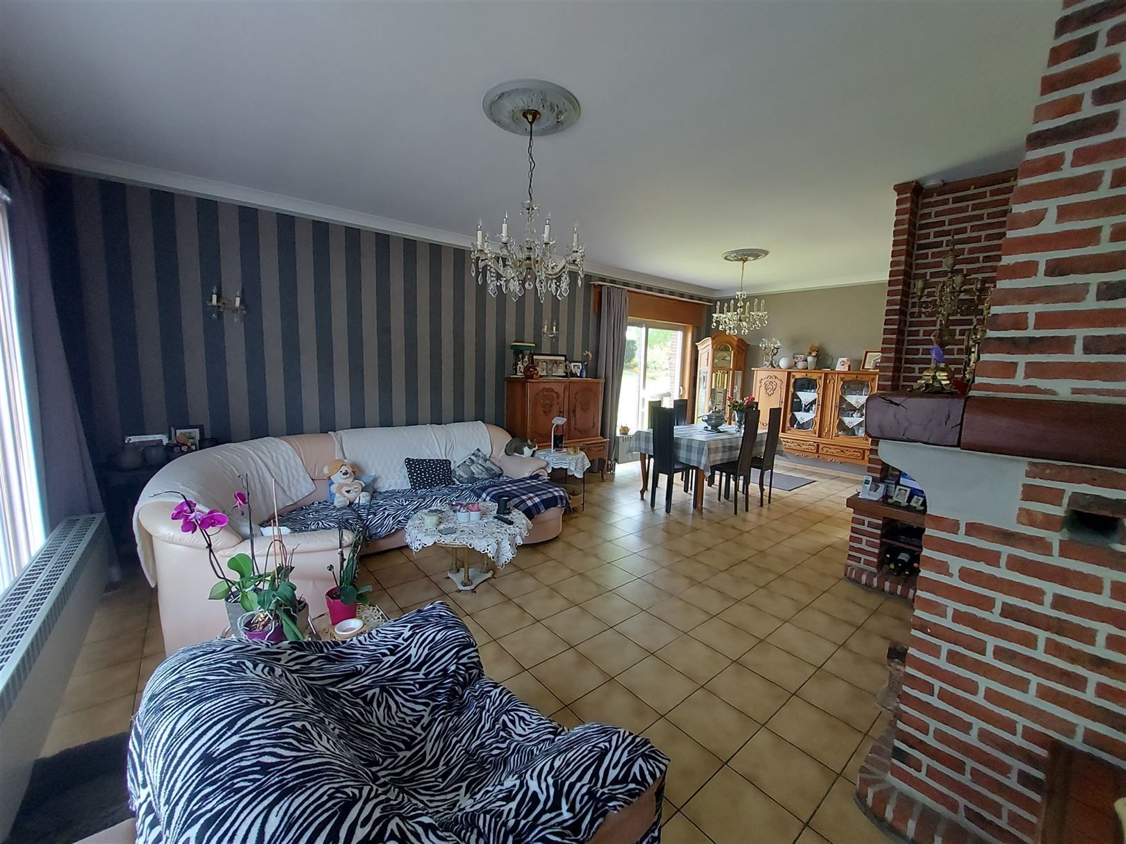 Veelzijdig renovatiepand met woonst en winkel Vloesberg foto 5