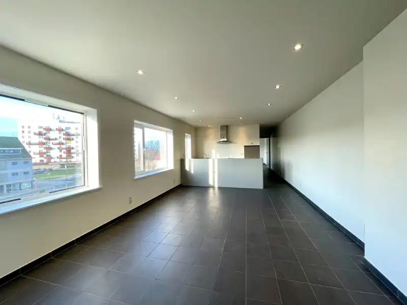 Instapklaar 1-slaapkamerappartement met zicht op het Groenplein – Zelzate foto 2