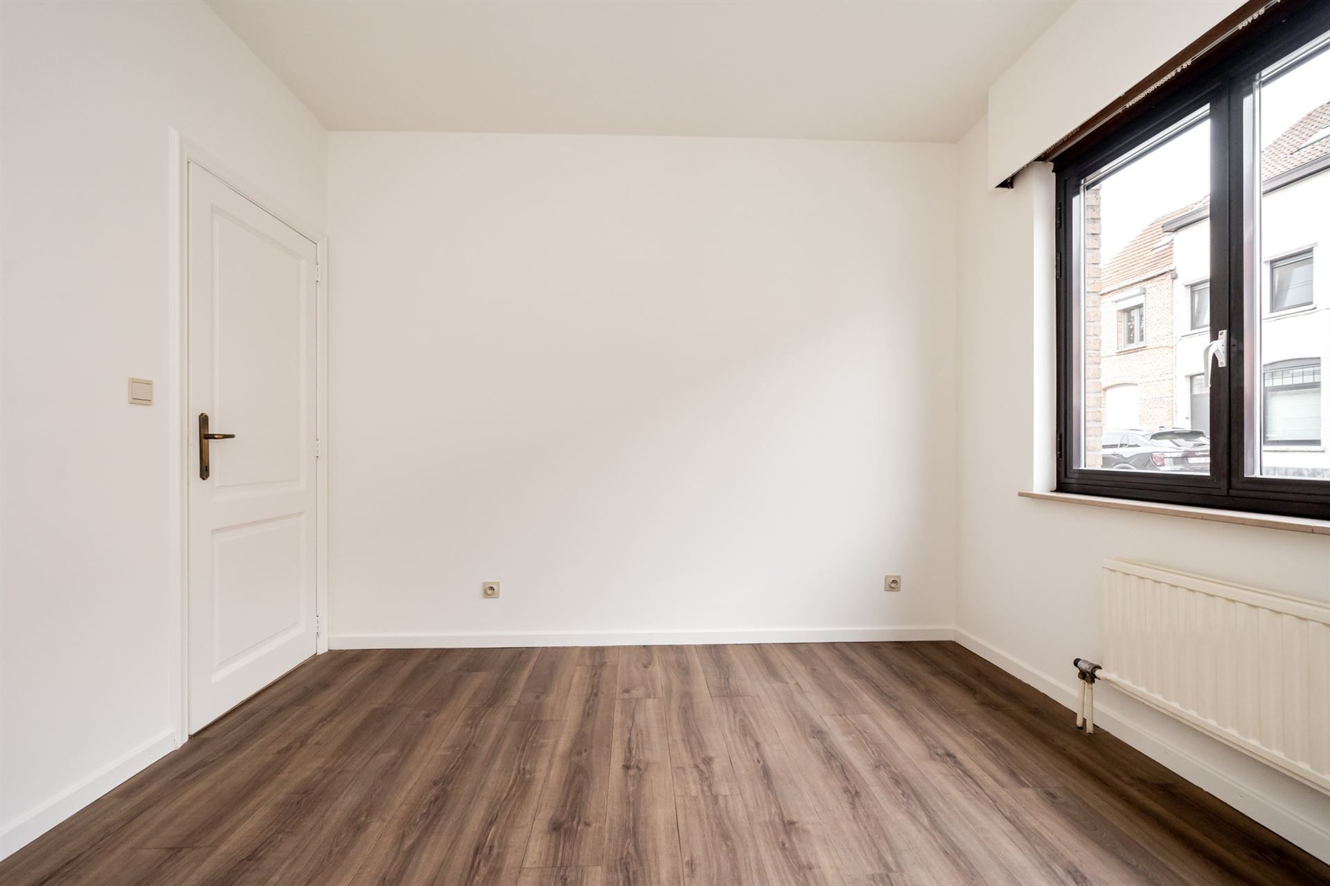 Gerenoveerd gelijkvloers appartement met 1 slpk & grote tuin foto 12