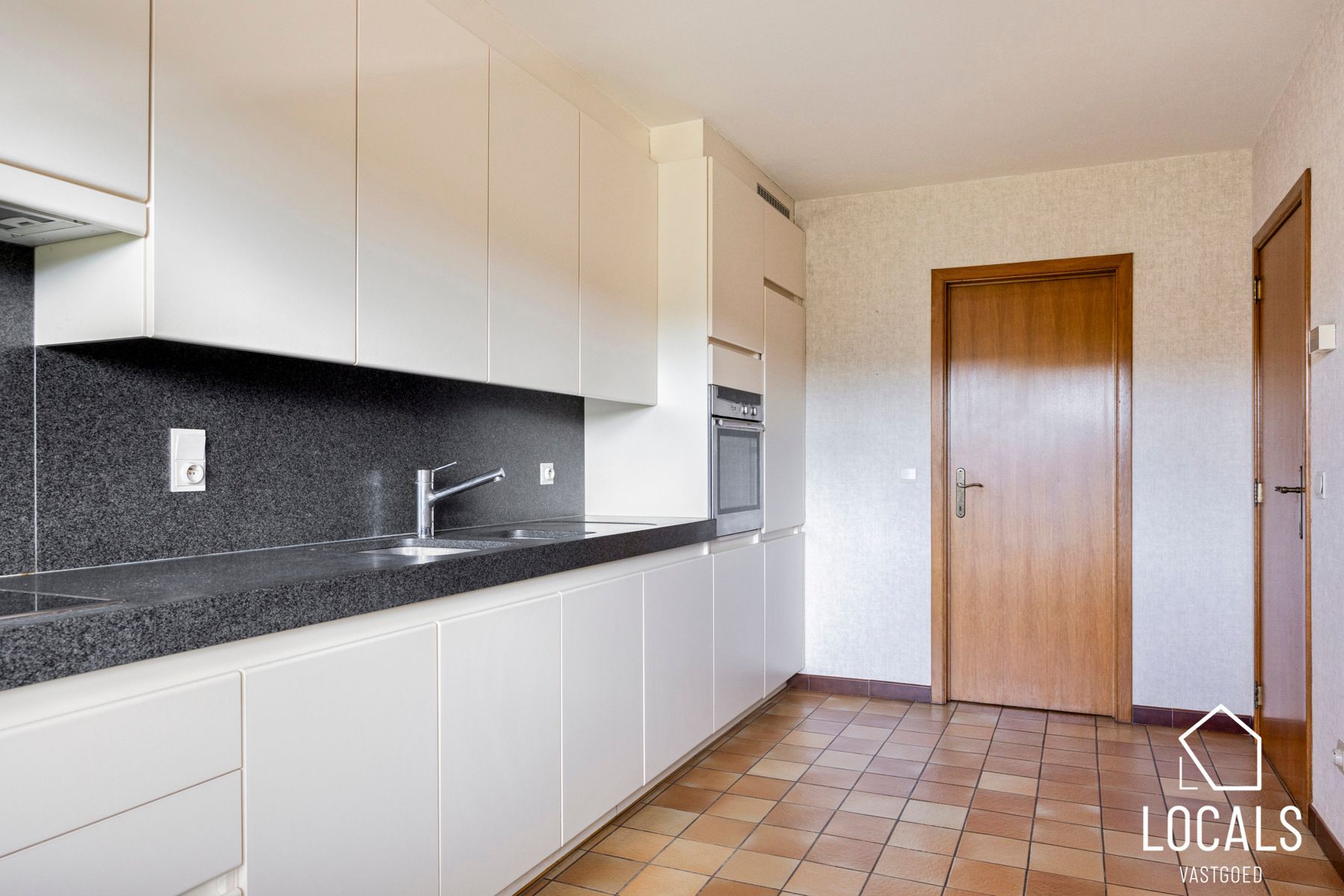 Gelijkvloers appartement met tuin foto 11