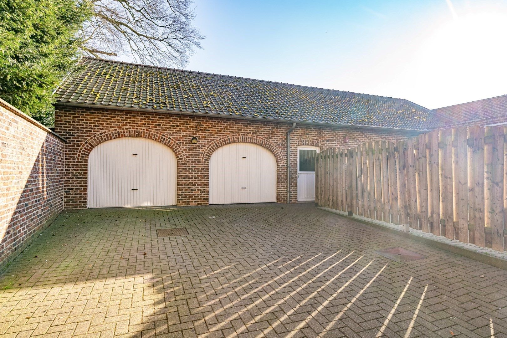 Duplexappartement (189 m²) met overdekt terras en garage in een statige herenwoning in het centrum van Hoeselt foto 23