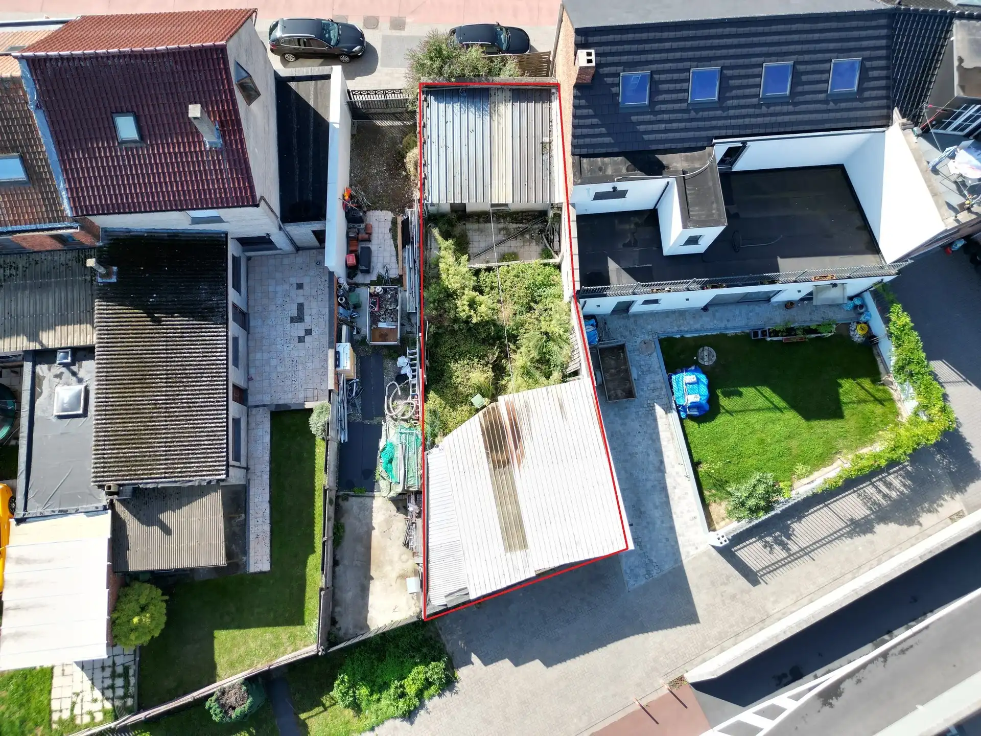 Bouwgrond met vergunde plannen op sterke ligging te Aalst foto {{pictureIndex}}