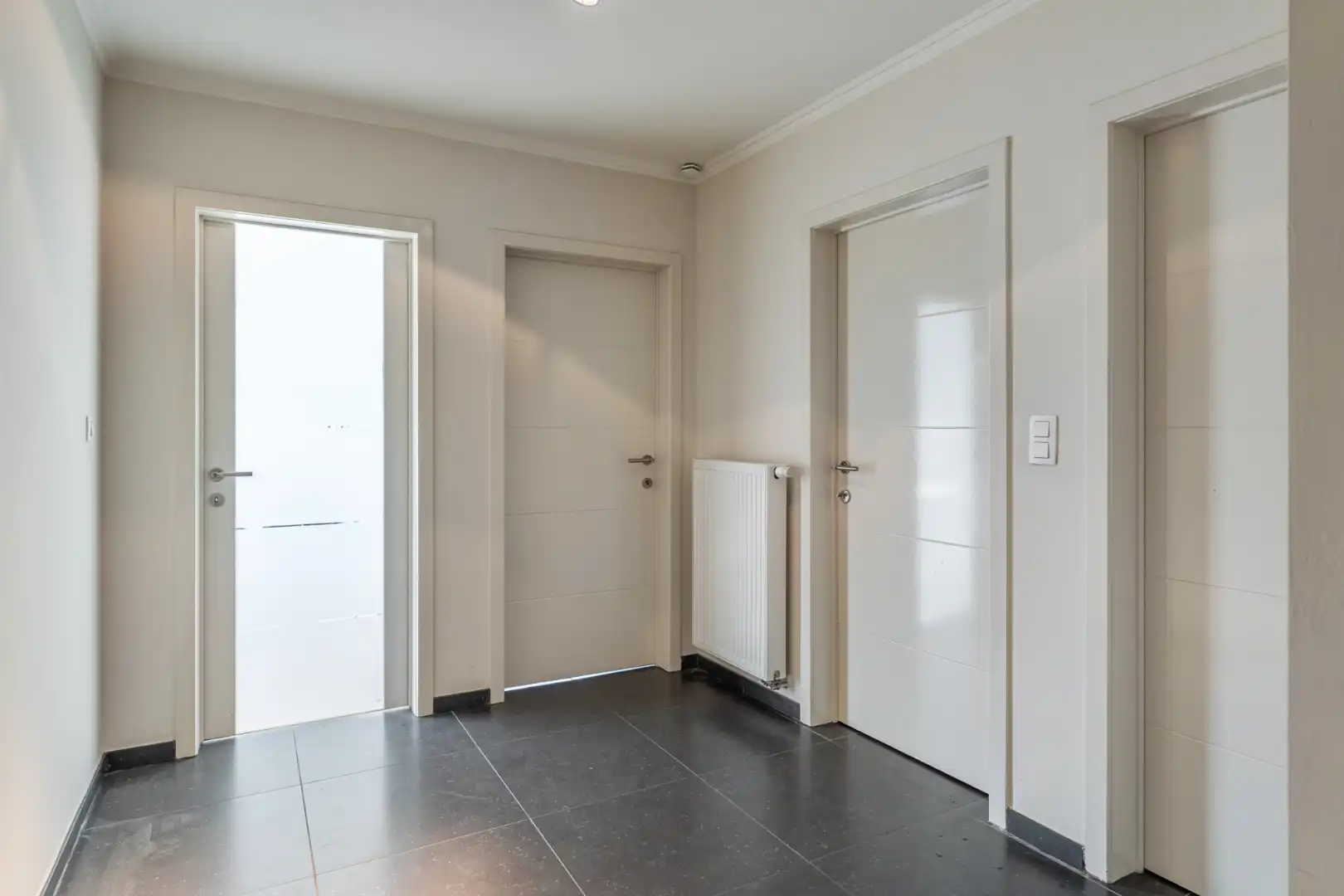 Exclusief penthouse met ruim terras, 2 slpk, extra brede autostaanplaats, centrum Houthalen foto 23