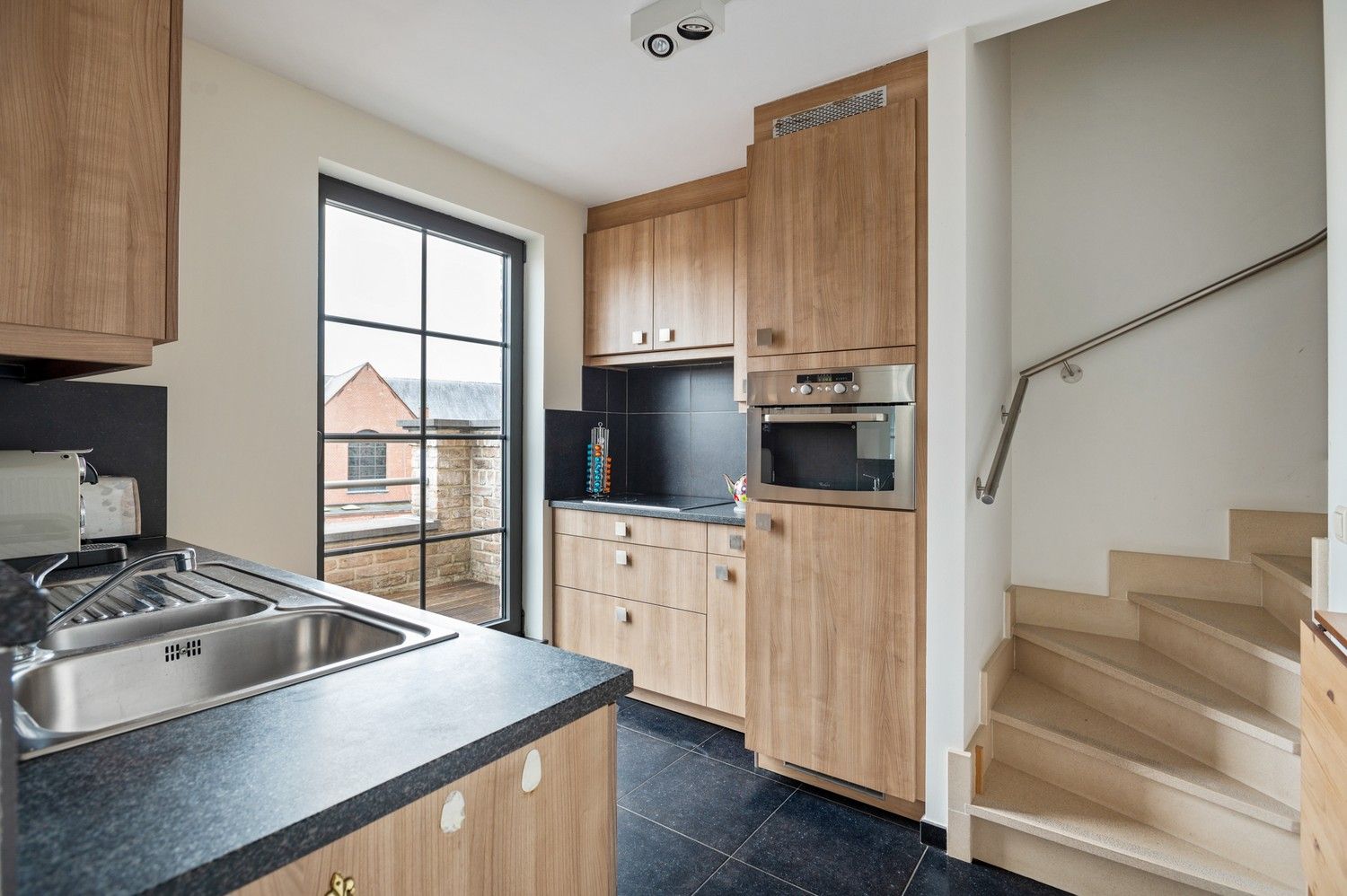 Ruim duplexappartement met 2 slaapkamers op toplocatie te Lint foto 11