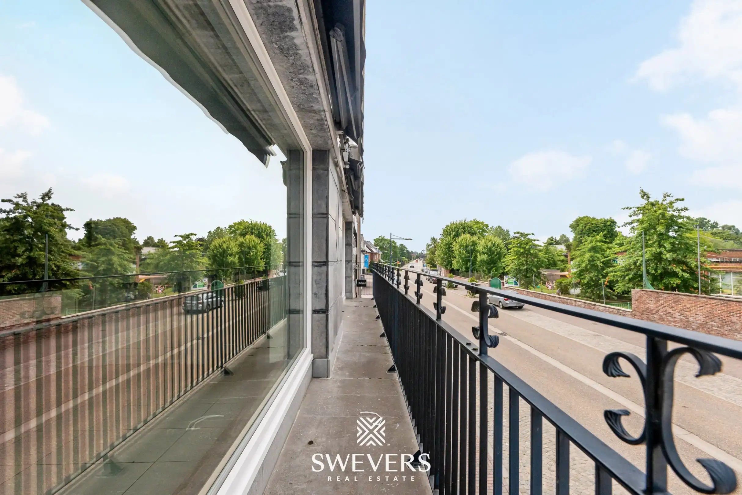 Veelzijdig handelspand met ruim duplex appartement: wonen, ondernemen én investeren onder één dak in centrum Alken foto 3
