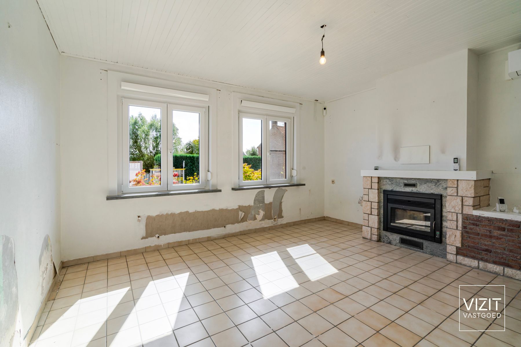 Zeer ruime halfopen woning aangename tuin foto 5
