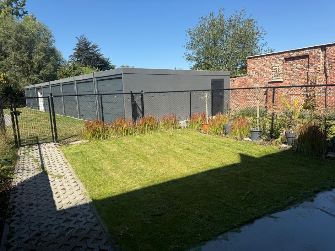 Gelijkvloers nieuwbouwappartement met terras en gezellig tuintje. foto 11