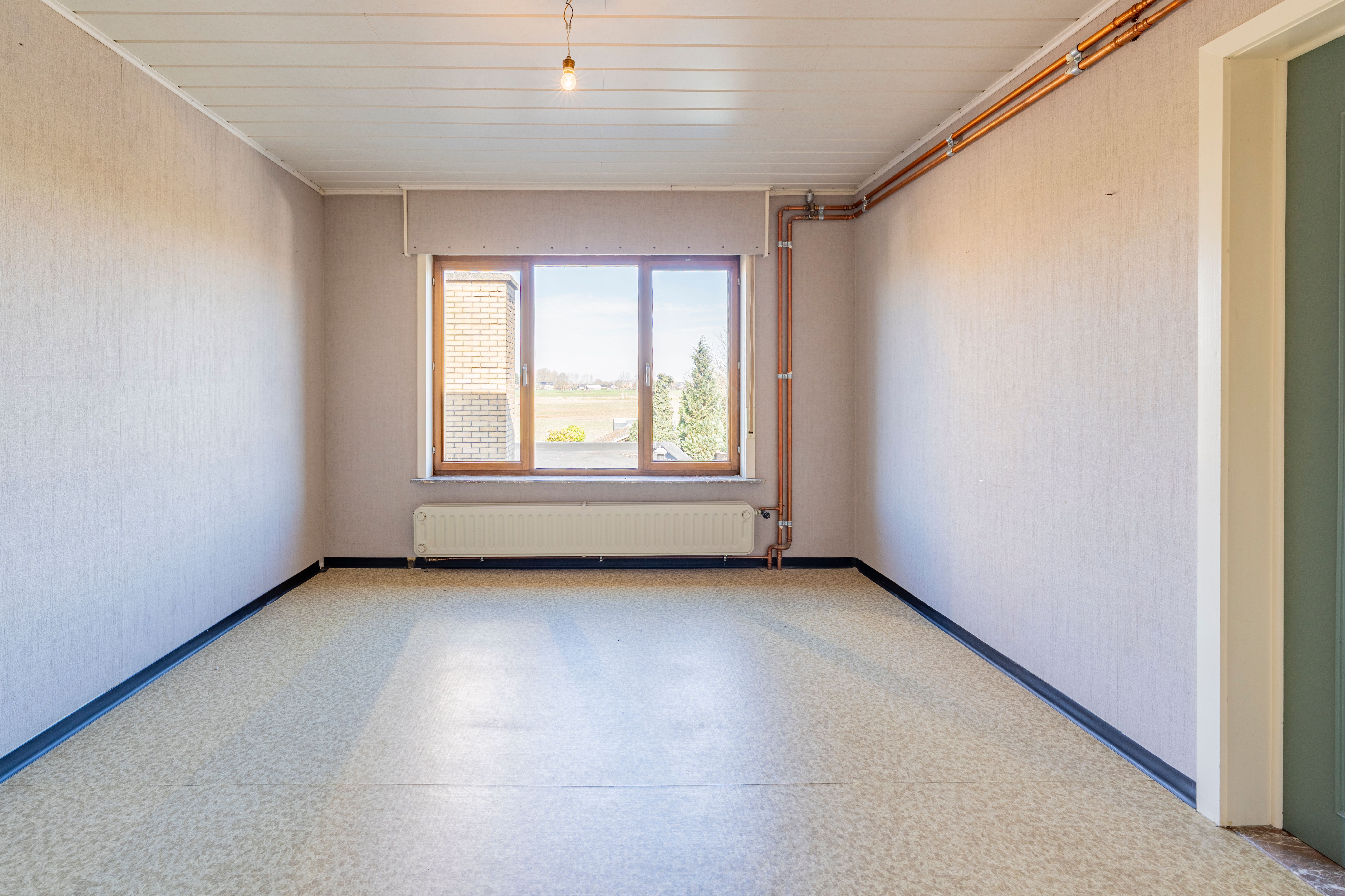 Halfopen bebouwing met landelijk zicht en garage te Oosteeklo foto 10