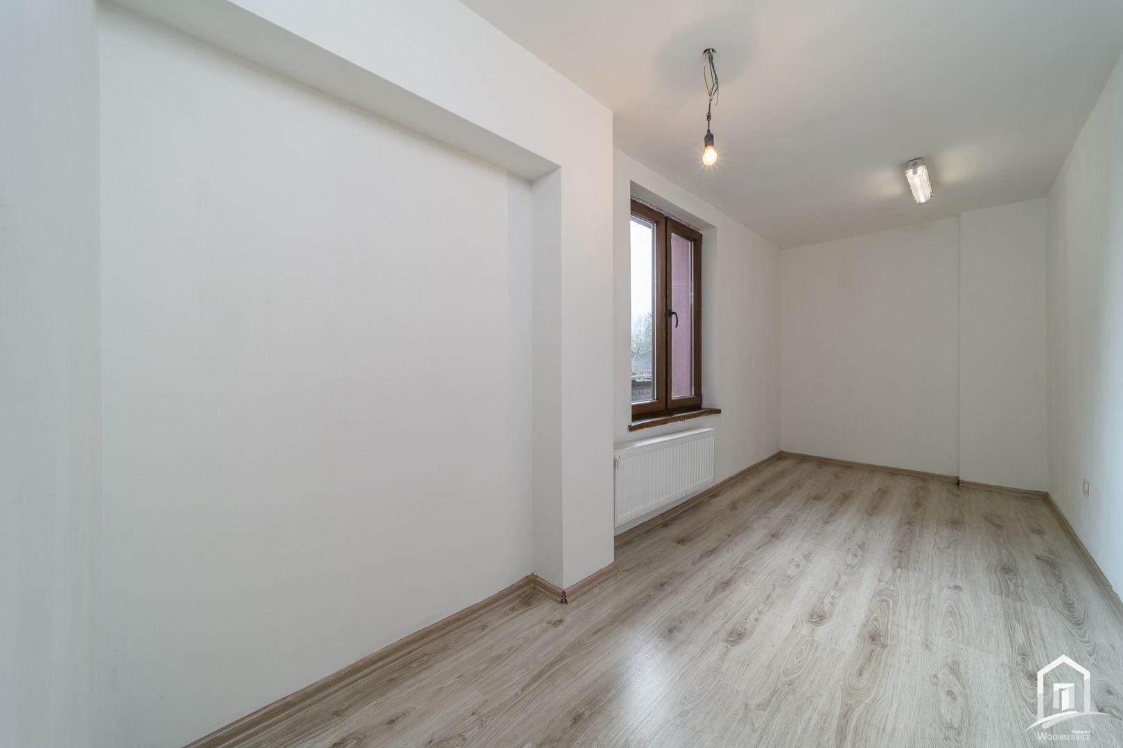 Verder af te werken gezinswoning te Zelzate foto 11