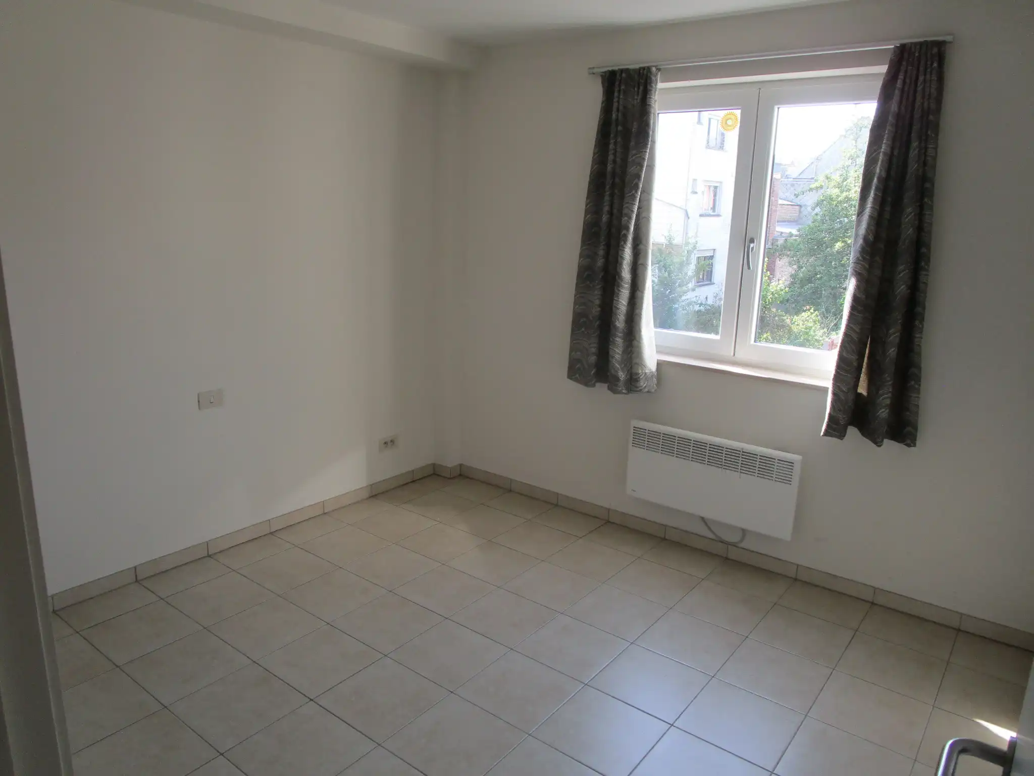 Zeer centraal gelegen appartement met 2 ruime slaapkamers en zonneterras foto 12