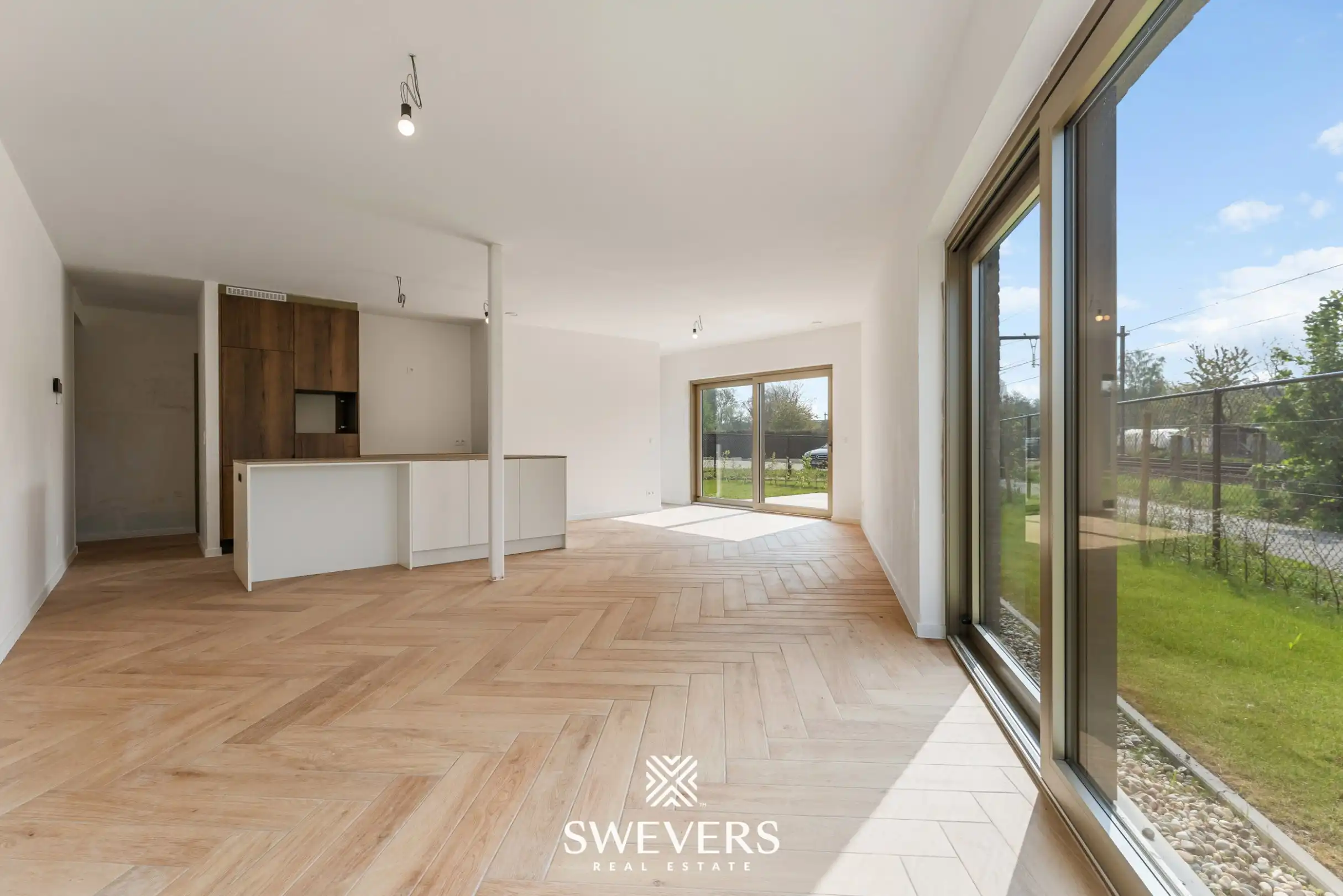 Instapklaar nieuwbouwappartement met zuidgerichte tuin in rustige, groene omgeving in project Oriole foto 2