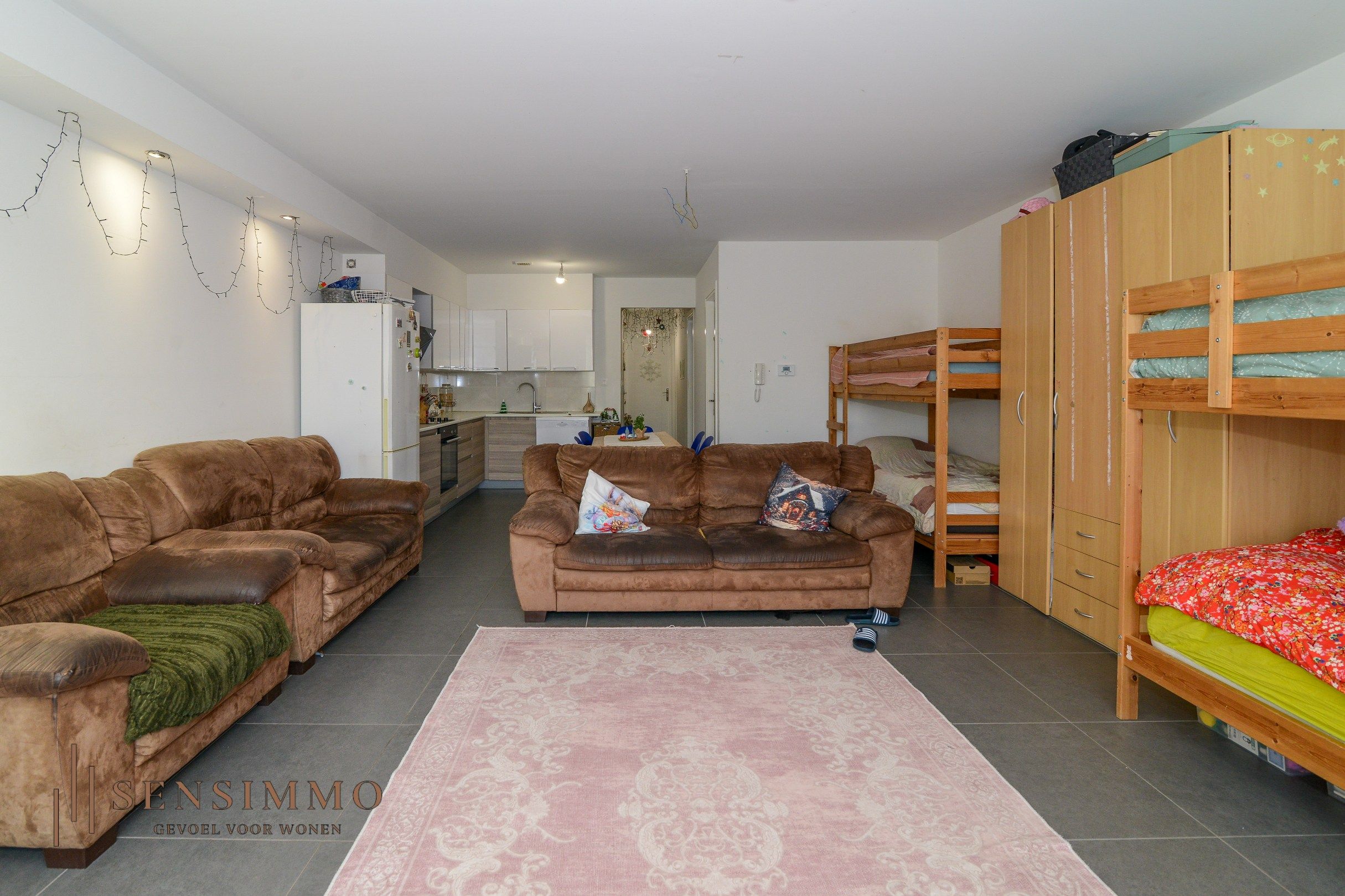 Gelijkvloers éénslaapkamer appartement met tuin, parking en kelderberging foto 5